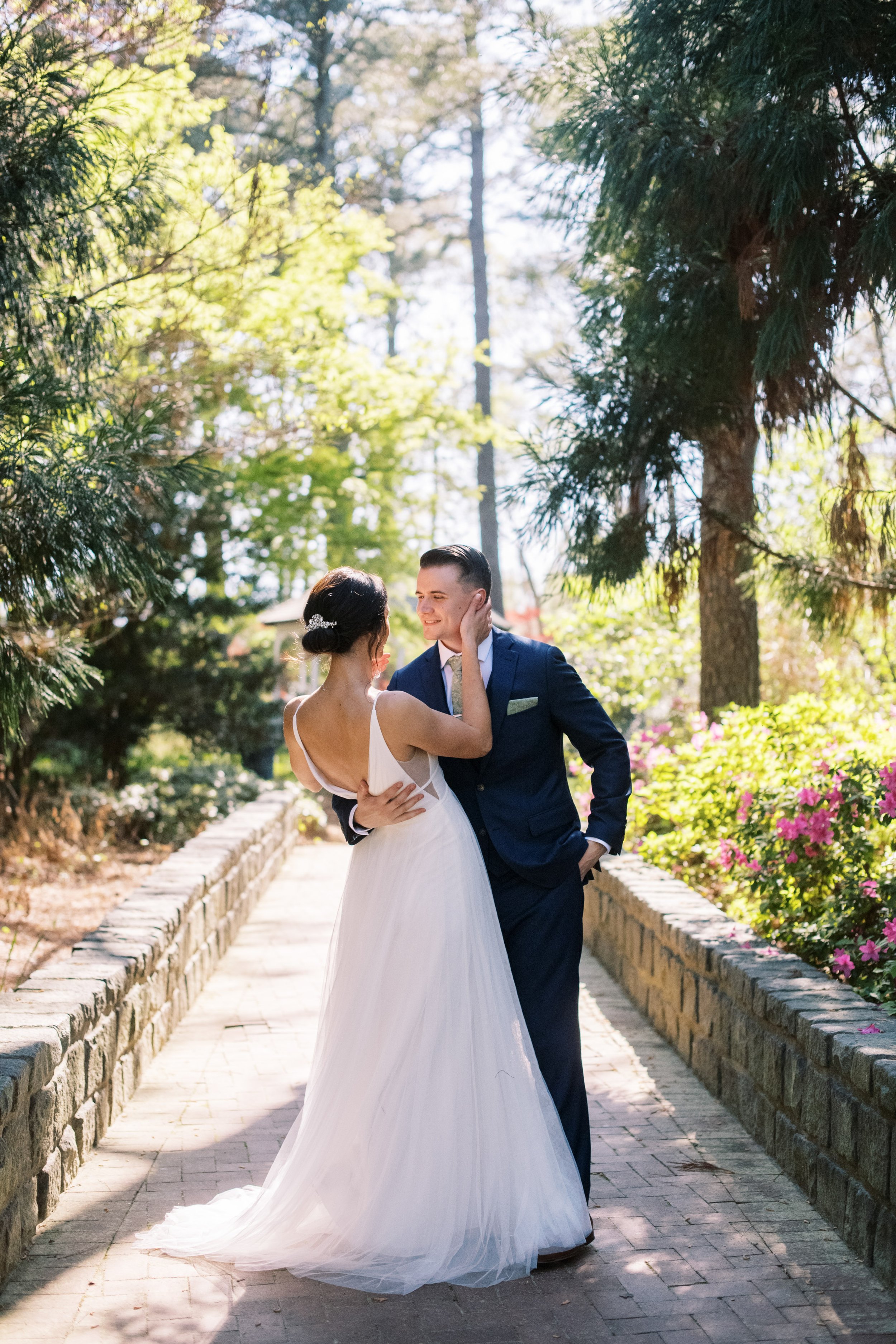 Bride Groom Dip in Pathway Cape Fear Botanical Garden Wedding Fancy This Photography
