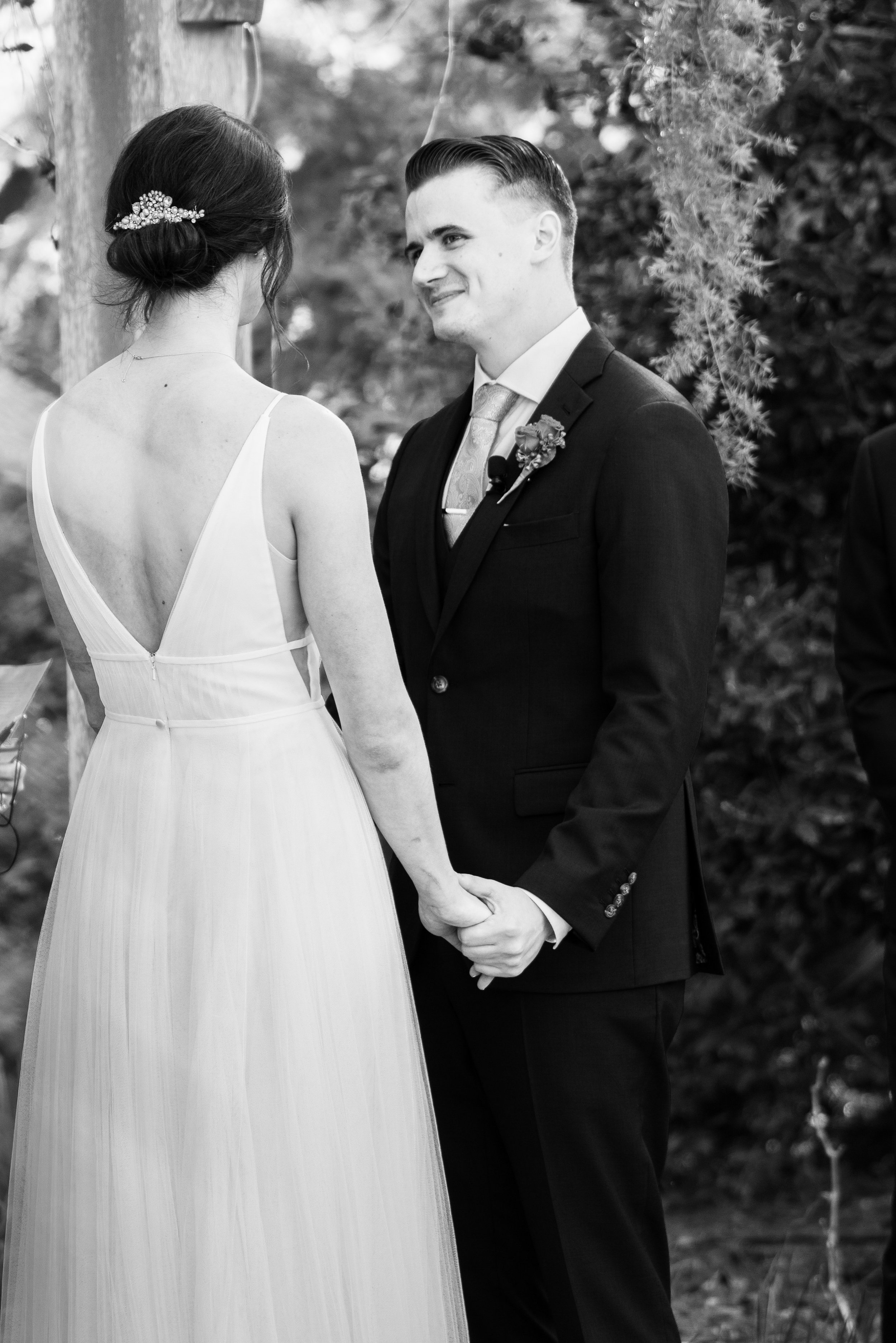 Groom ceremony vows in Cape Fear Botanical Garden wedding. 