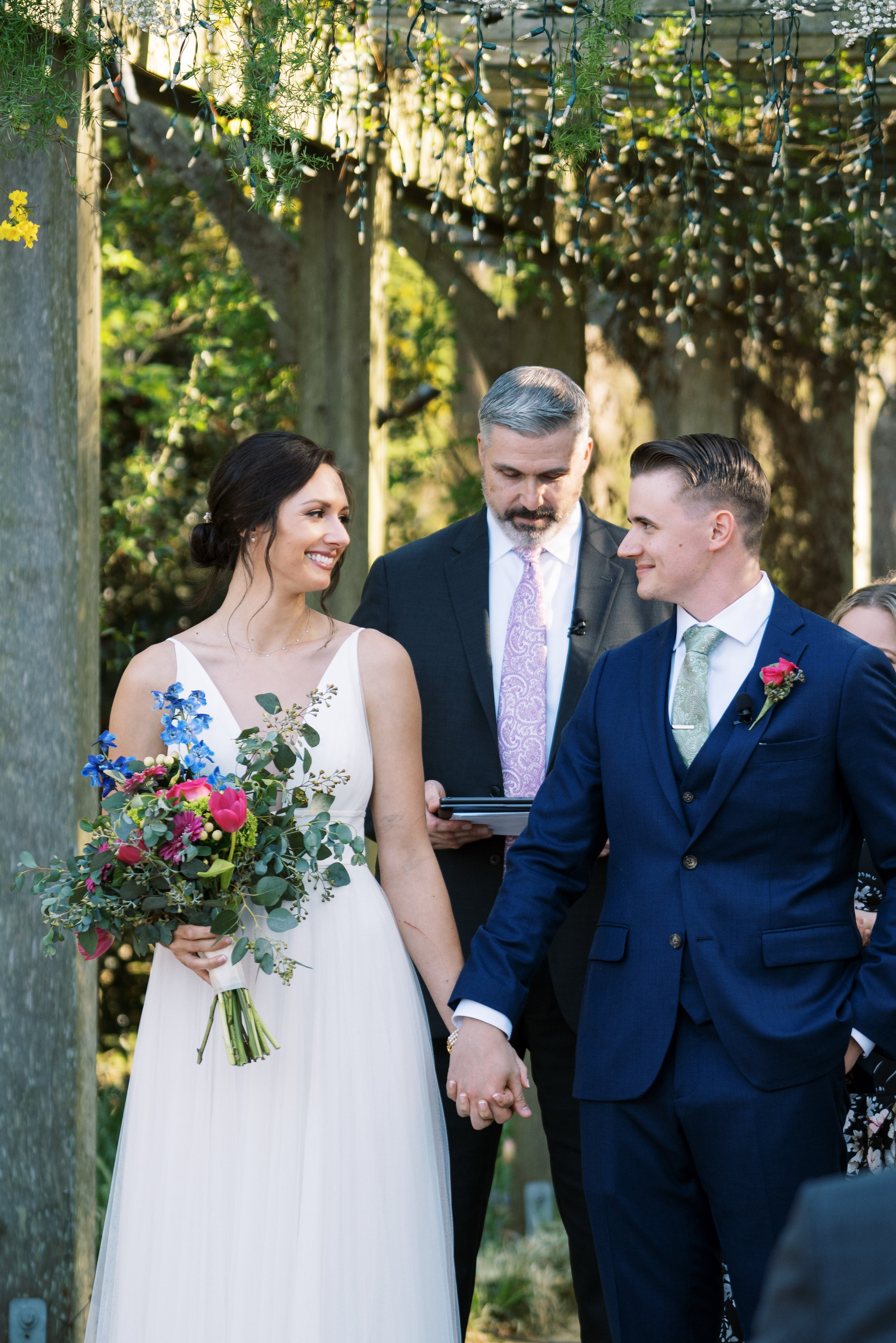Groom Looks at Bride After Ceremony Vows in Cape Fear Botanical Garden Wedding