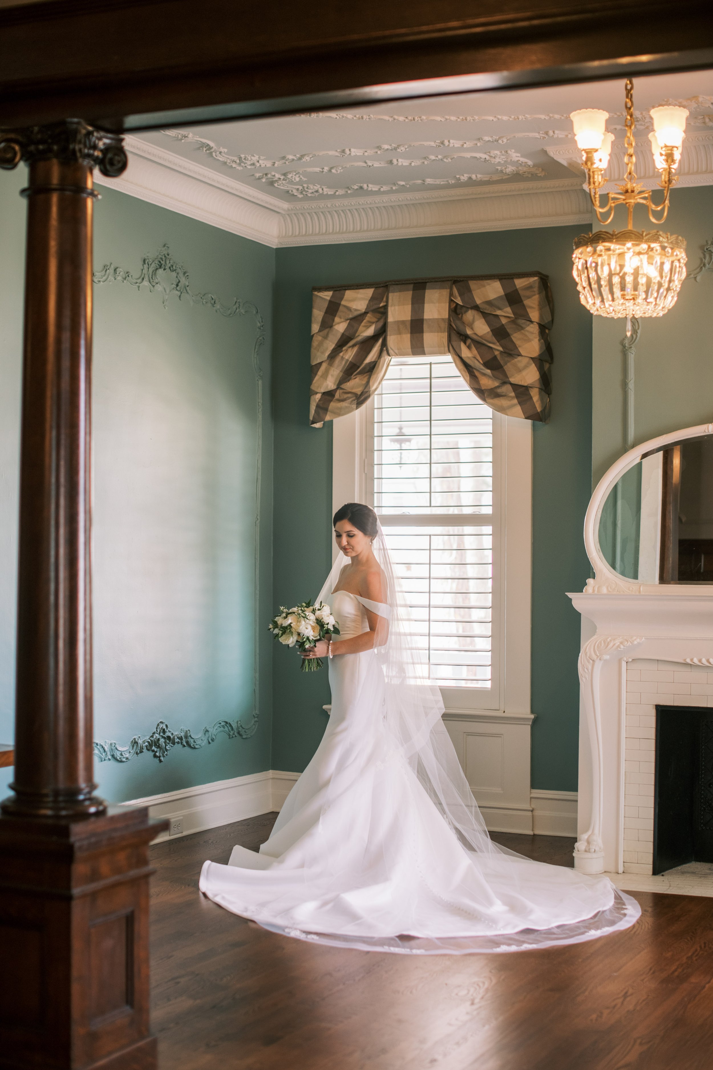 Vintage Chandelier Bridal Portraits at River Forest Manor and Marina Fancy This Photography