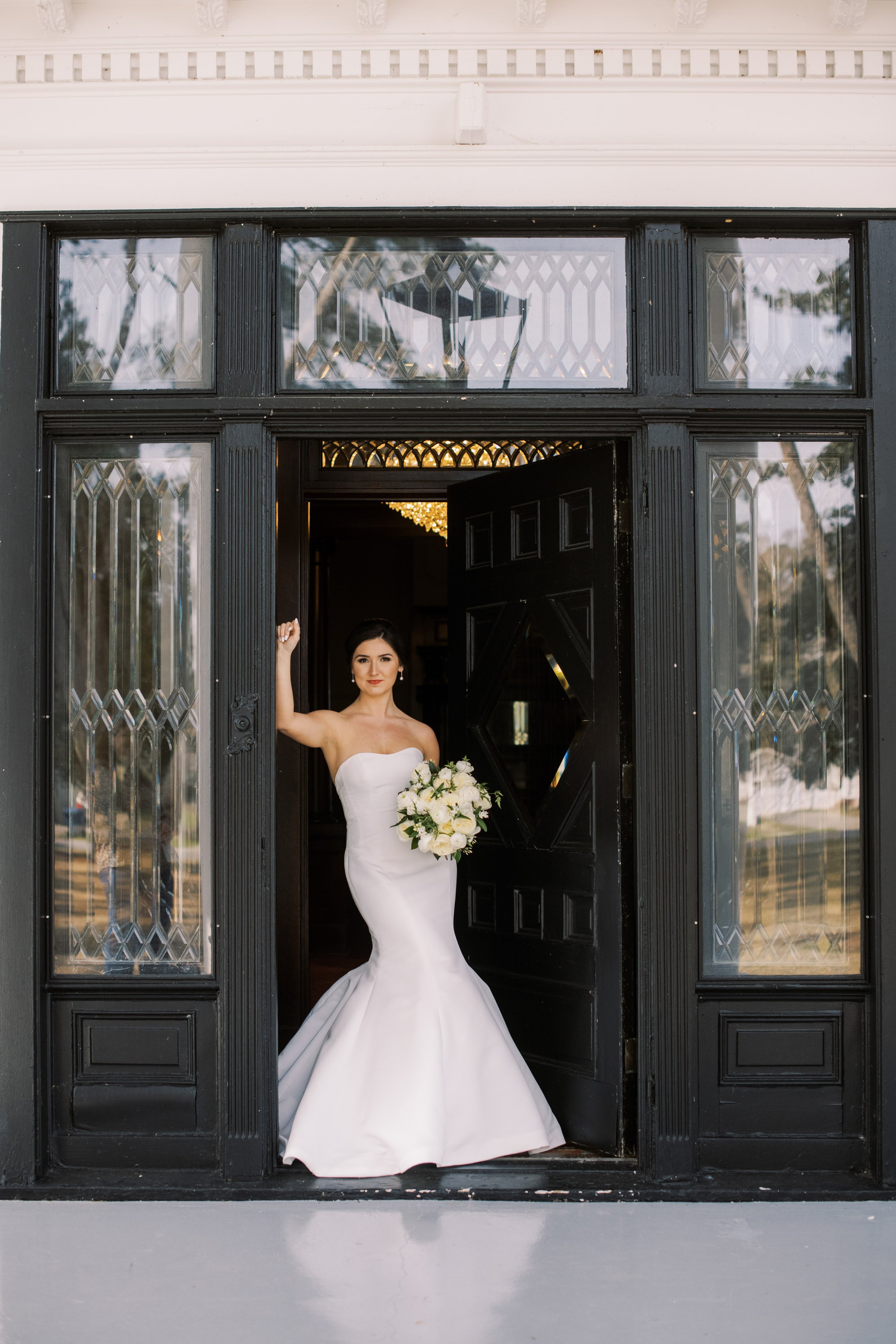 Strong Bride Doorway Pose Bridal Portraits at River Forest Manor and Marina Fancy This Photography