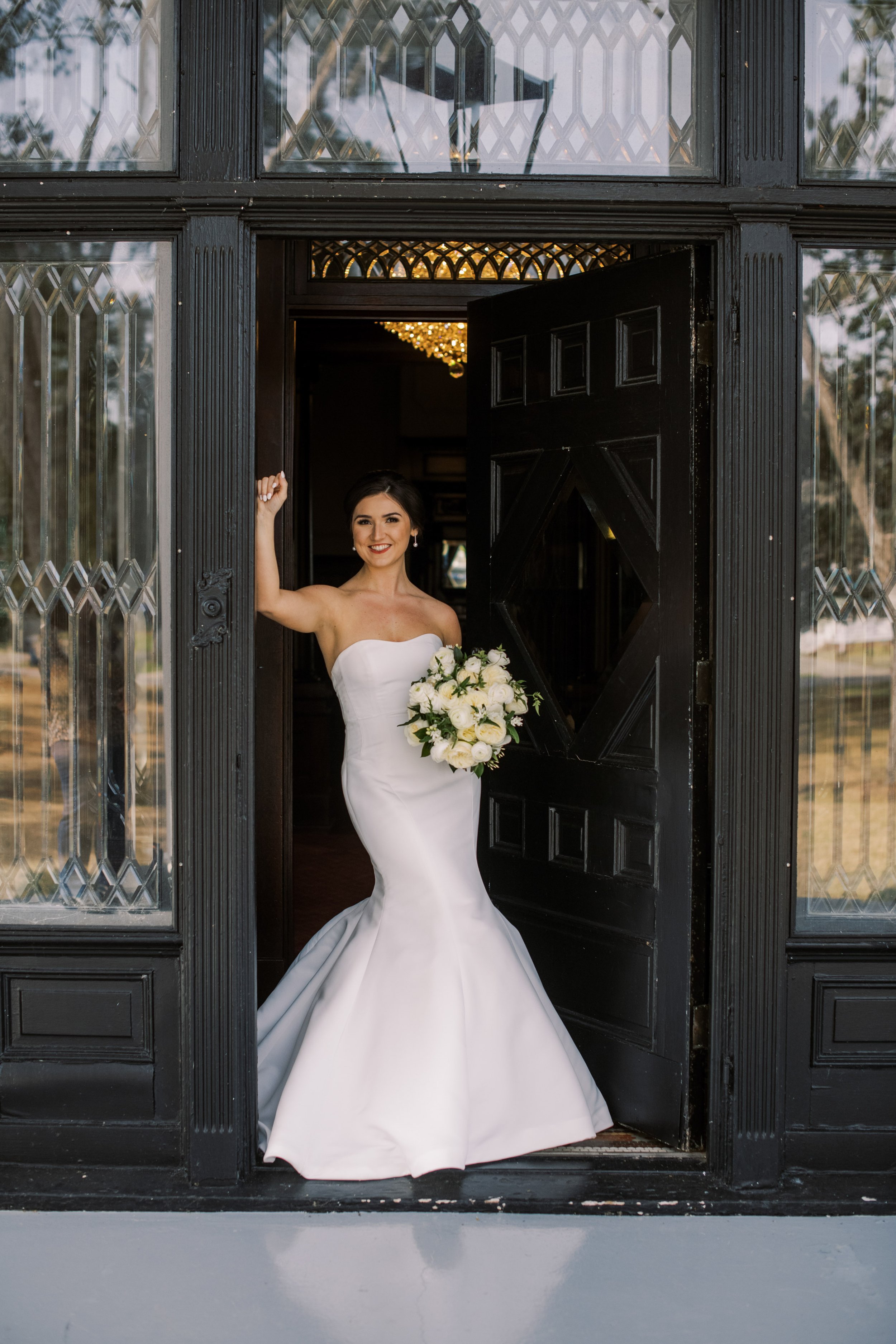 Strong Bride in Doorway Bridal Portraits at River Forest Manor and Marina Fancy This Photography