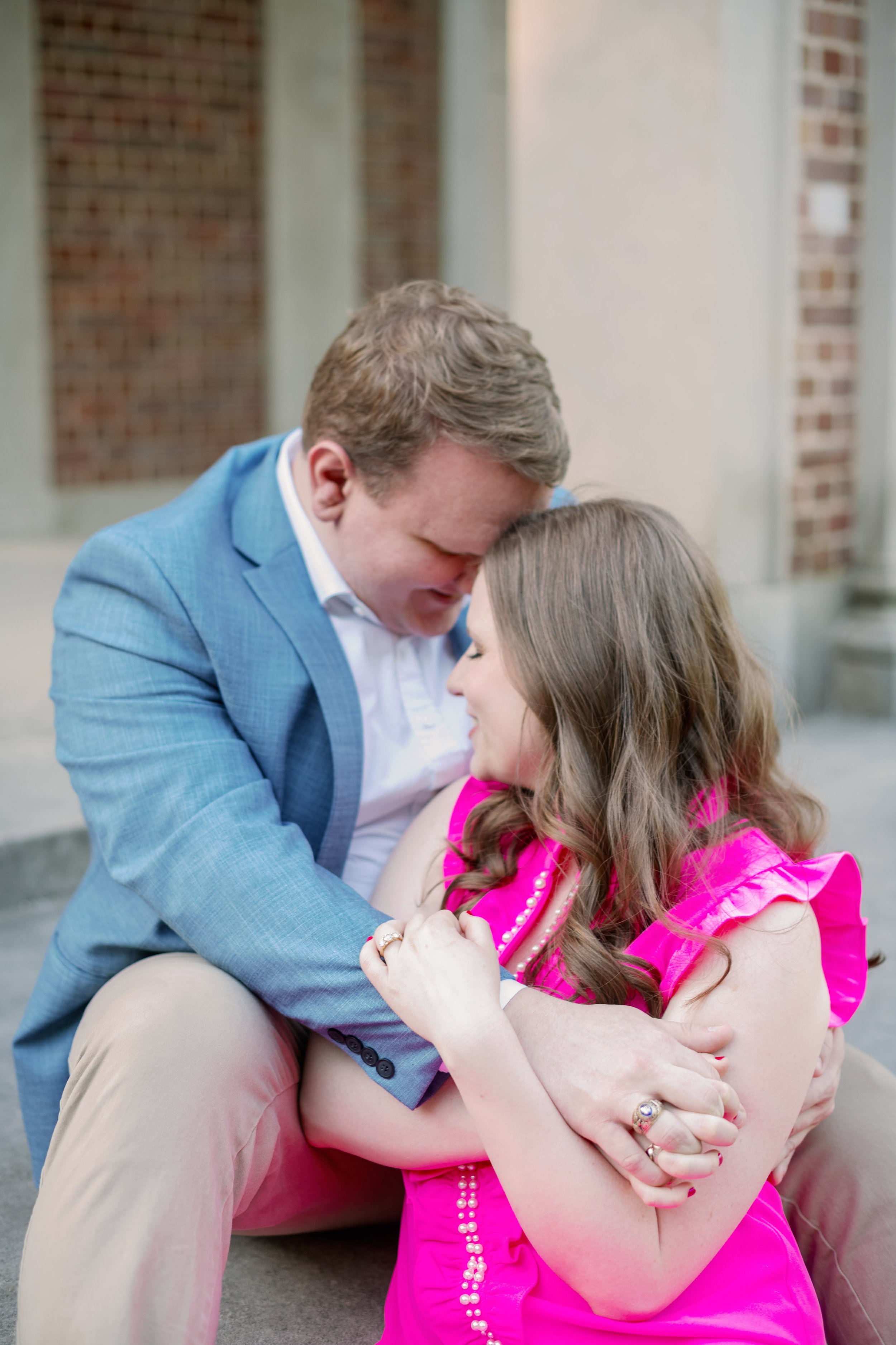 Couple Embraces on Staircase of Bell Tower UNC Chapel Hill Engagement Photos Fancy This Photography