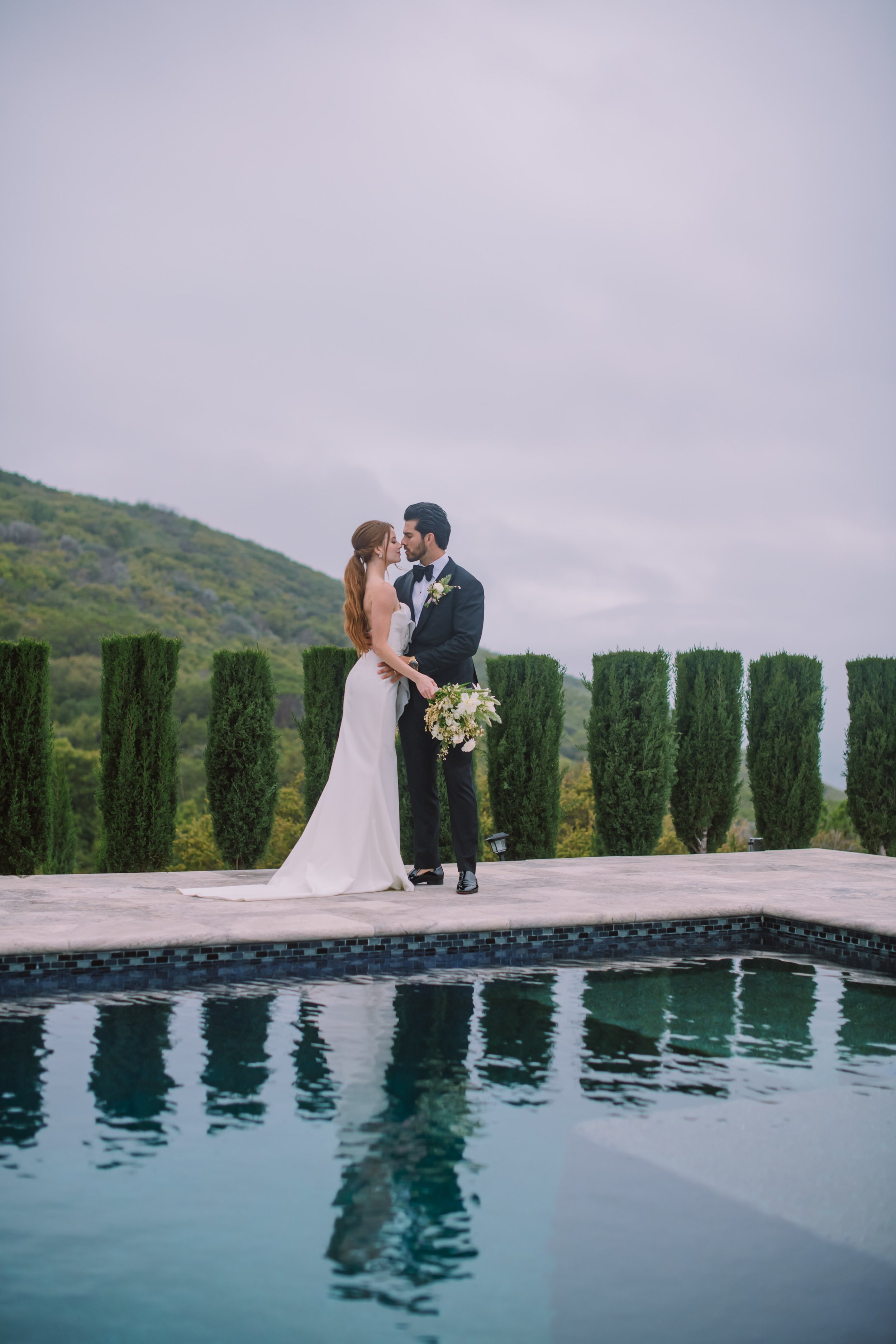 Bride and Groom Pool Reflection Stone Mountain Estates Wedding Venue Fancy This Photography