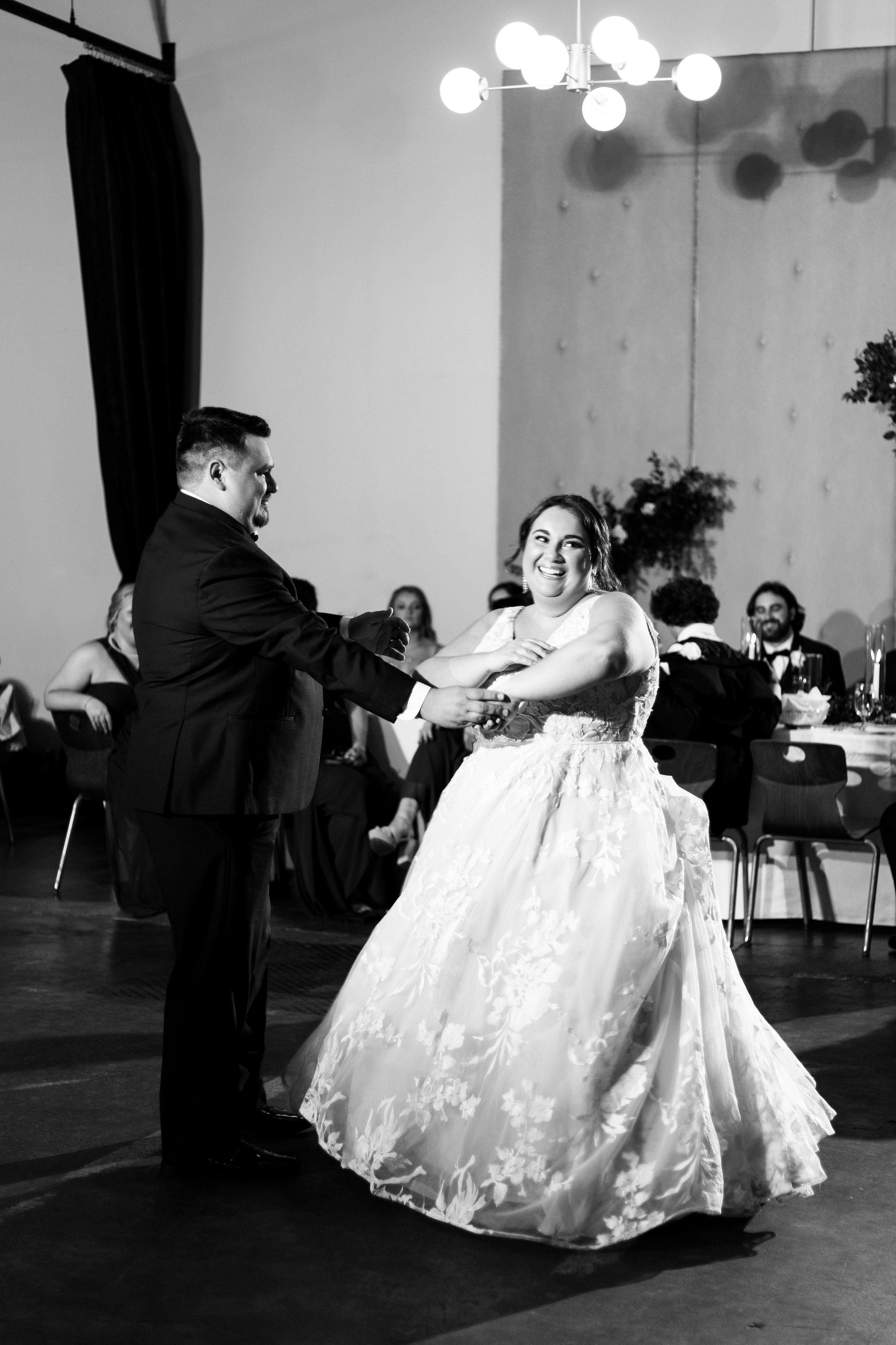 Bride and Groom First Dance Black and White Image Whitaker and Atlantic Unique Raleigh Wedding Venue Options Fancy This Photography