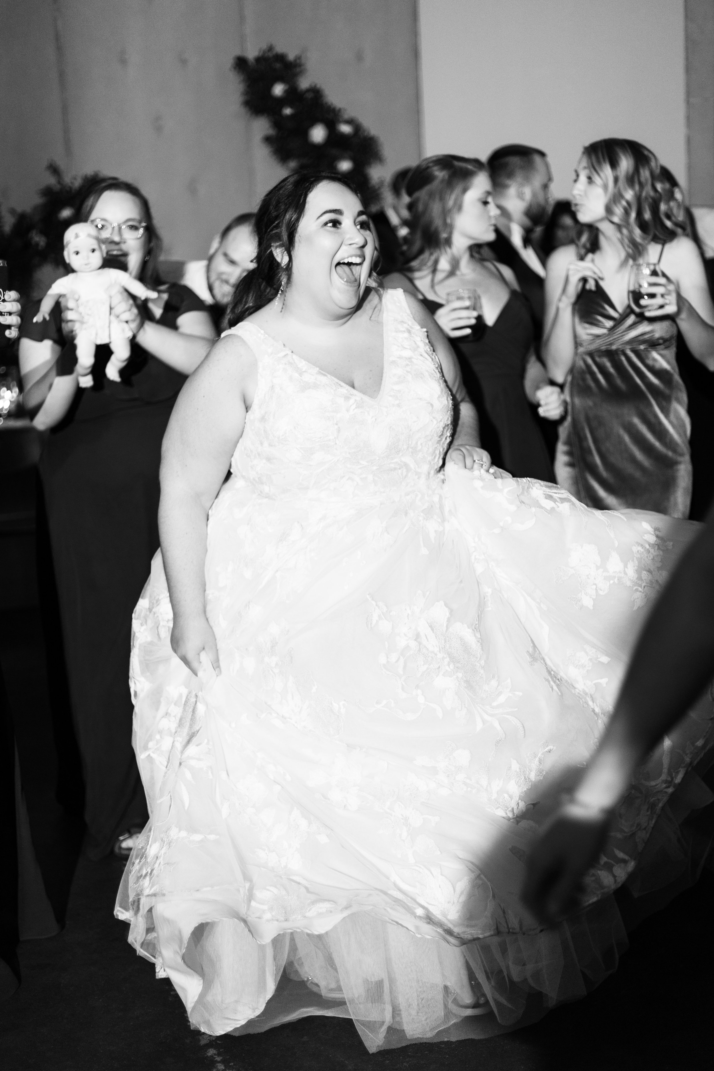 Happy Bride on Dance Floor Black and White Whitaker and Atlantic Unique Raleigh Wedding Venue Options Fancy This Photography