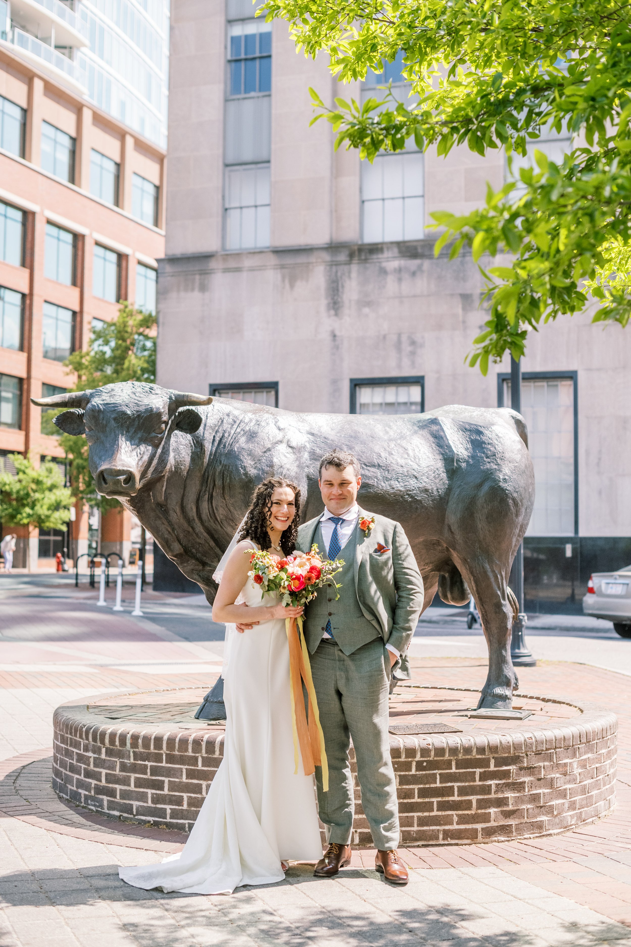 Bride and Groom Major the Bull at 21c Museum Hotel Durham Wedding Fancy This Photography