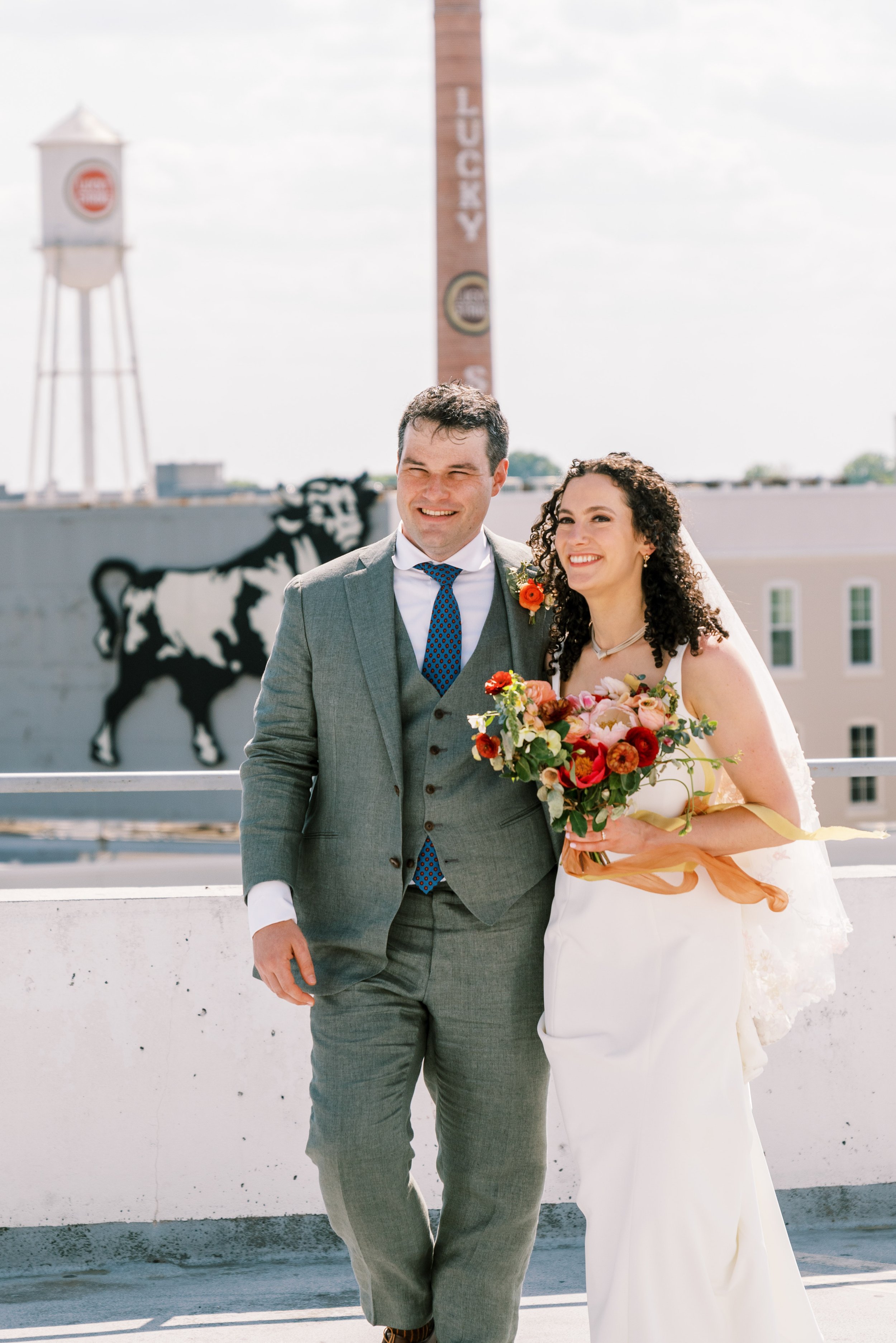 Bride and Groom Classic Downtown Portrait 21c Museum Hotel Durham Wedding Fancy This Photography