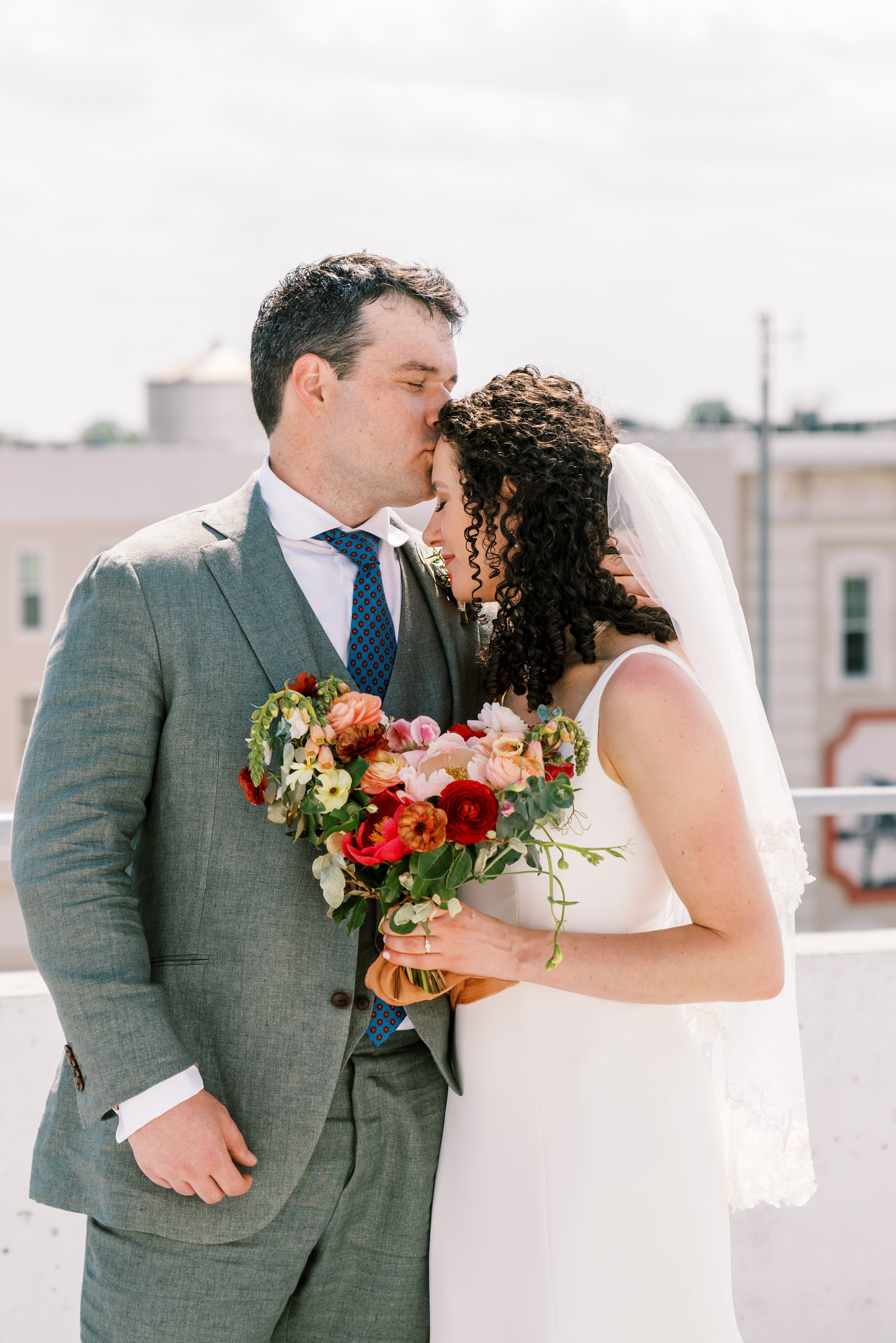 Forehead Kiss Groom and Bride 21c Museum Hotel Durham Wedding Fancy This Photography