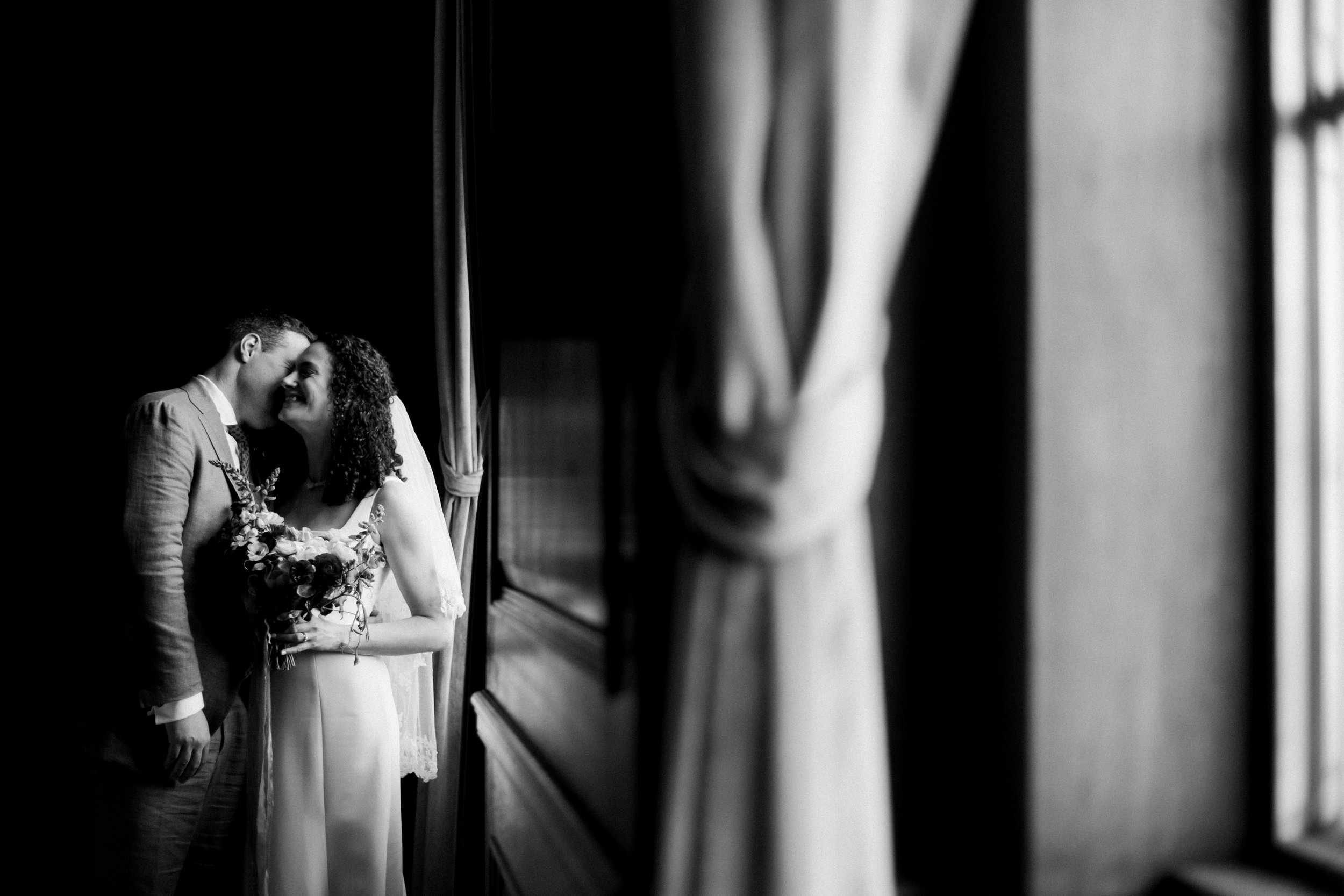 Black and White Just Married Bride and Groom at 21c Museum Hotel Durham Wedding Fancy This Photography 
