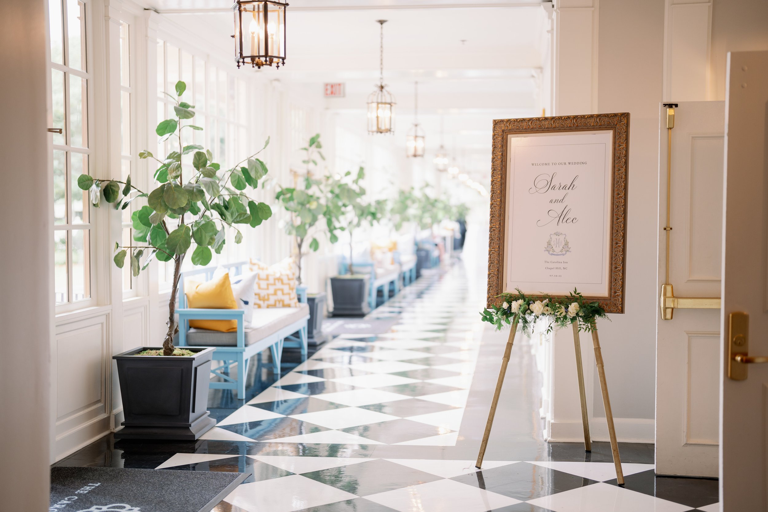 Black and White Checkered Hallway and Signage Wedding at The Carolina Inn