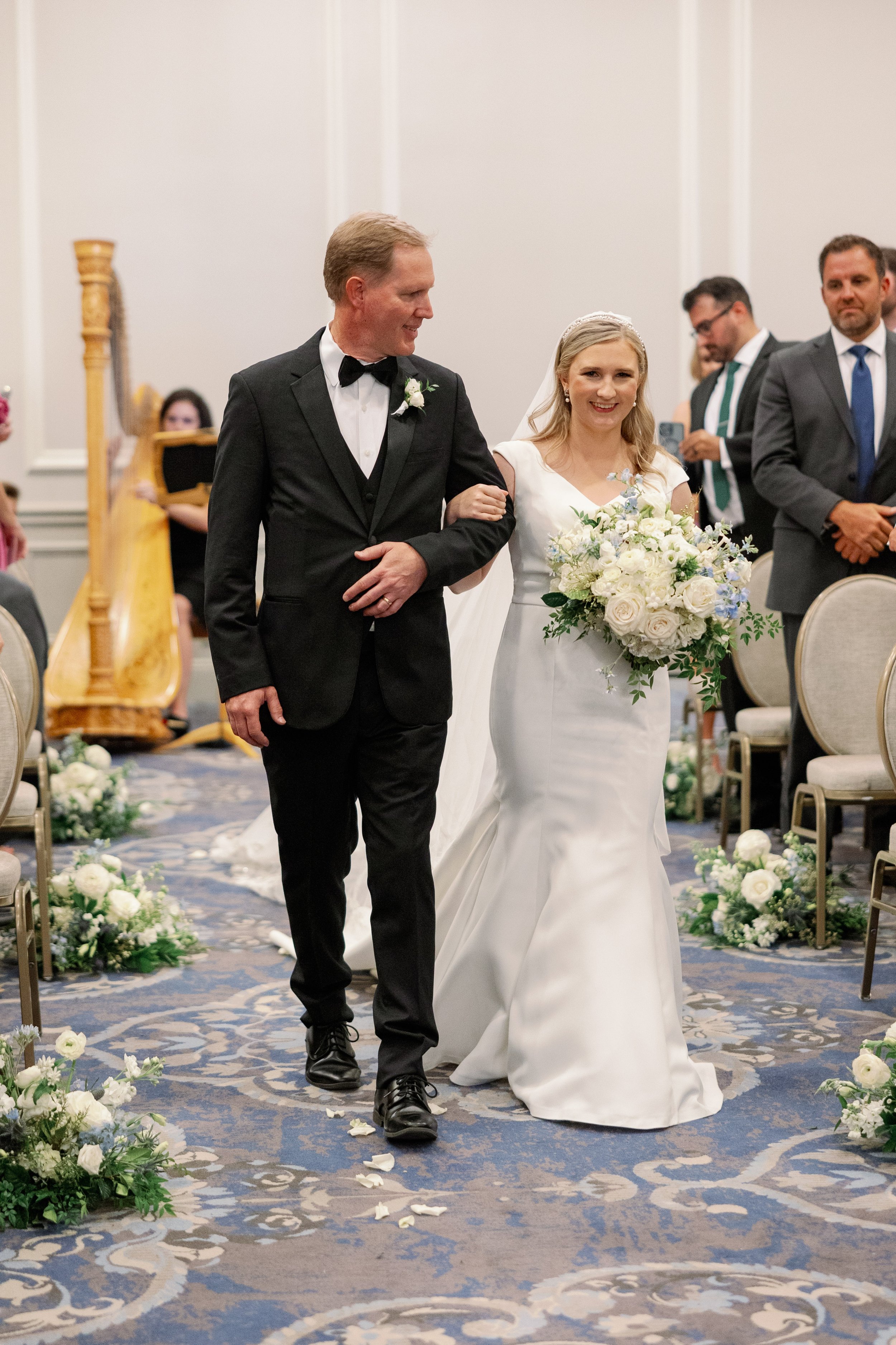 Bride Walks Down Aisle of Wedding at The Carolina Inn