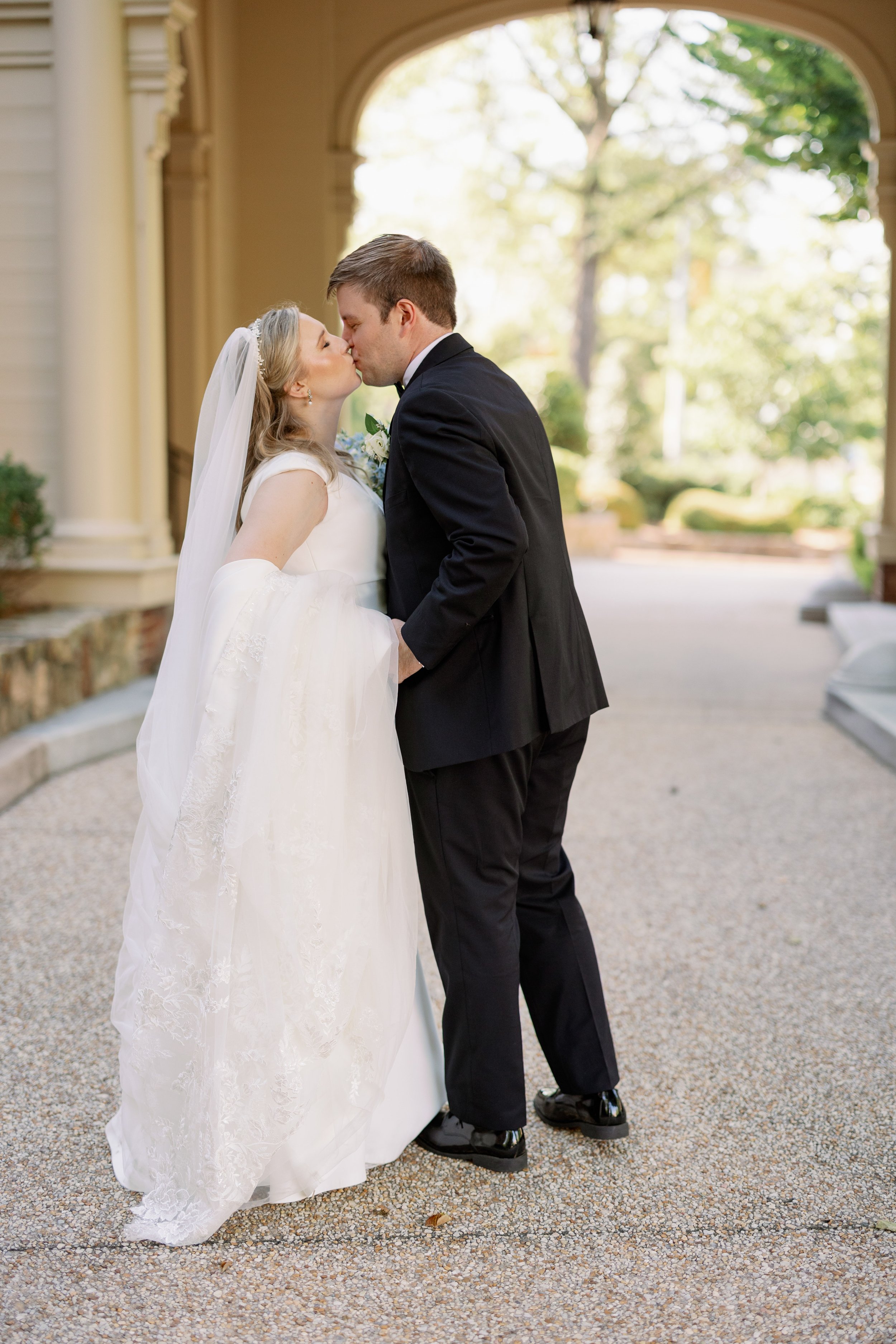 Bride and Groom Pathway Kiss Wedding at The Carolina Inn Fancy This Photography