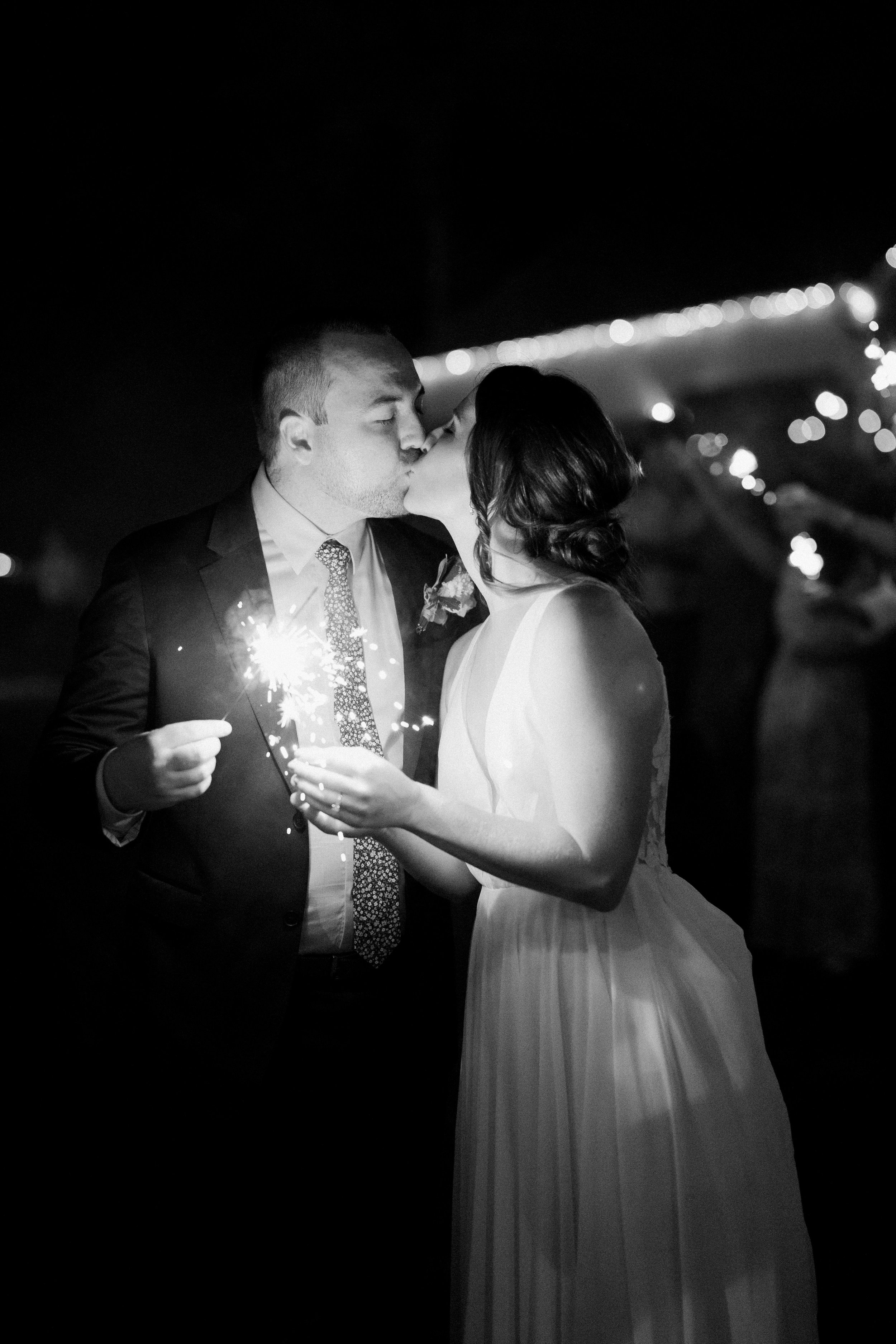 Black and White Sparkler Exit Kiss Lavender Wedding in Chapel Hill North Carolina 