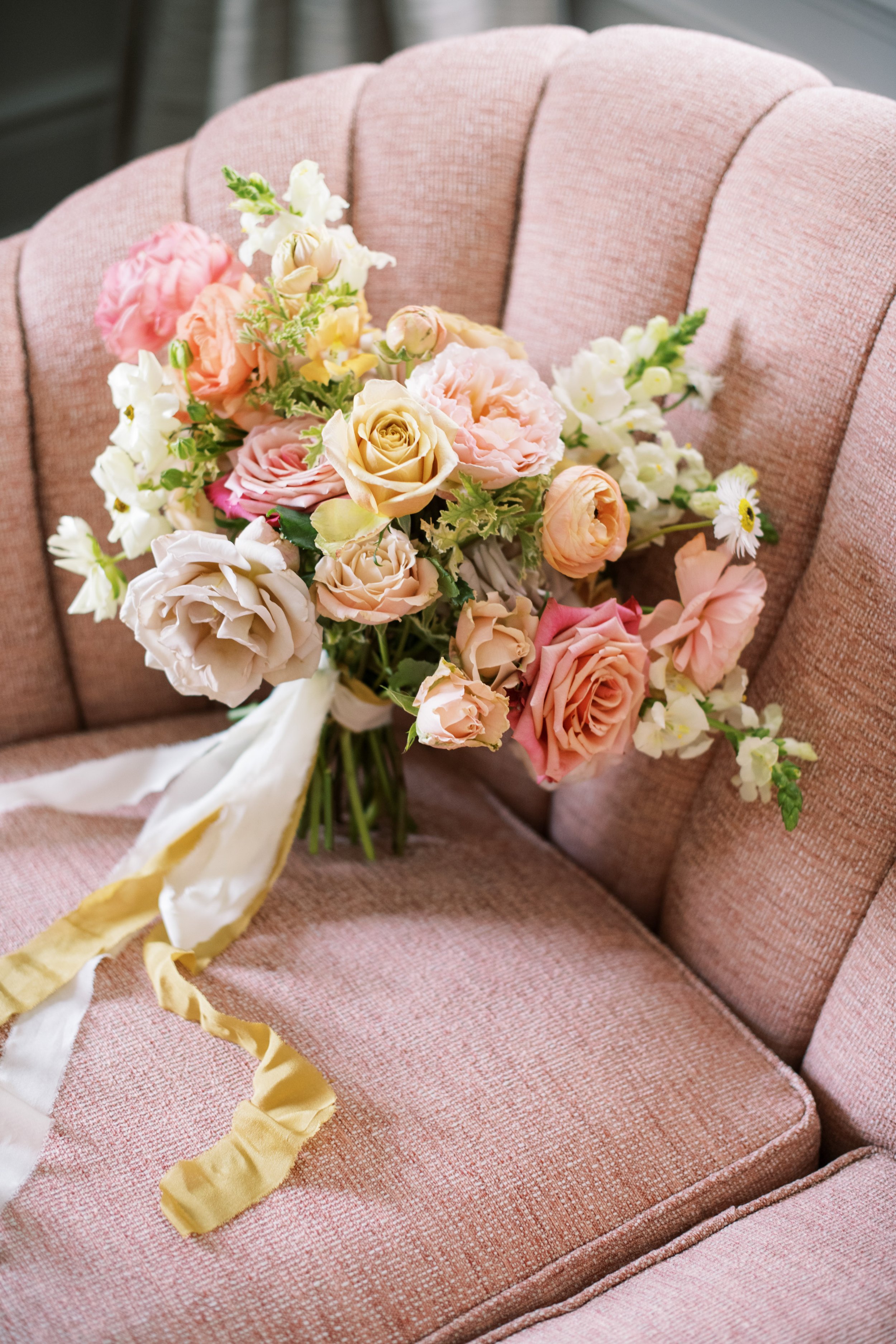 Bouquet on Chair The McAlister-Leftwich House Wedding Venue Fancy This Photography