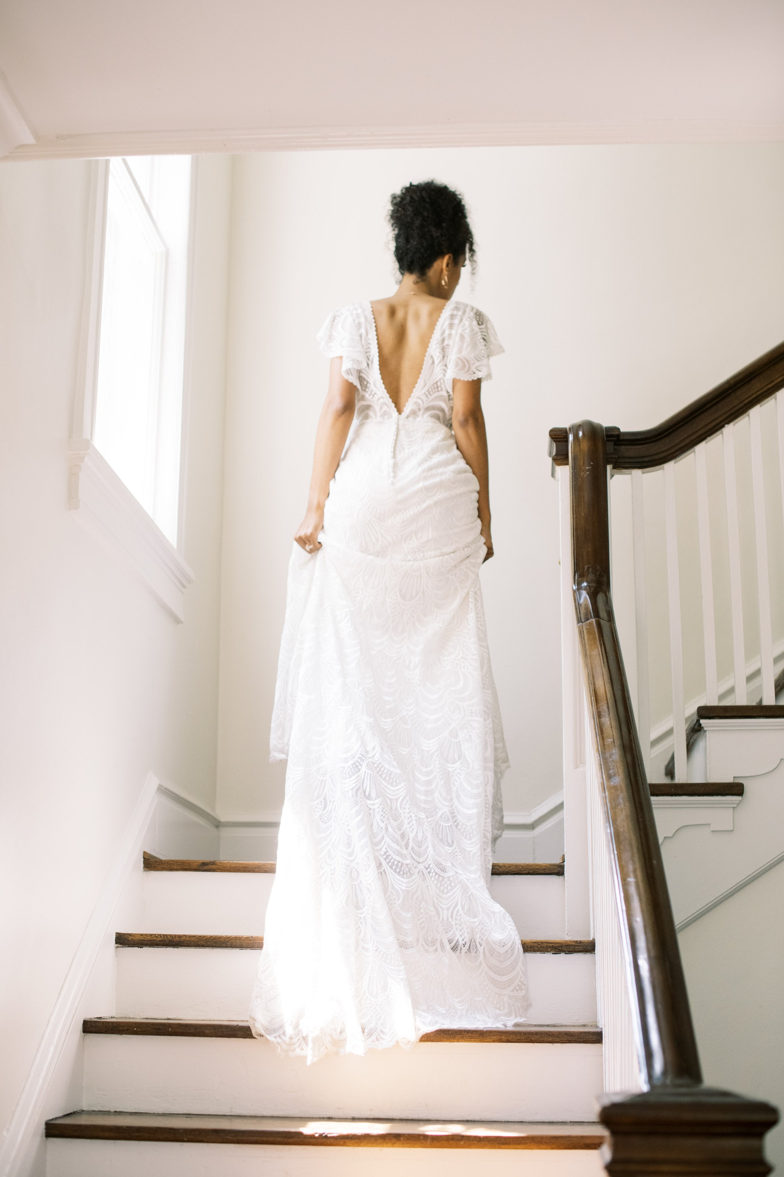 Bride on Staircase of The McAlister-Leftwich House Wedding Venue Fancy This Photography
