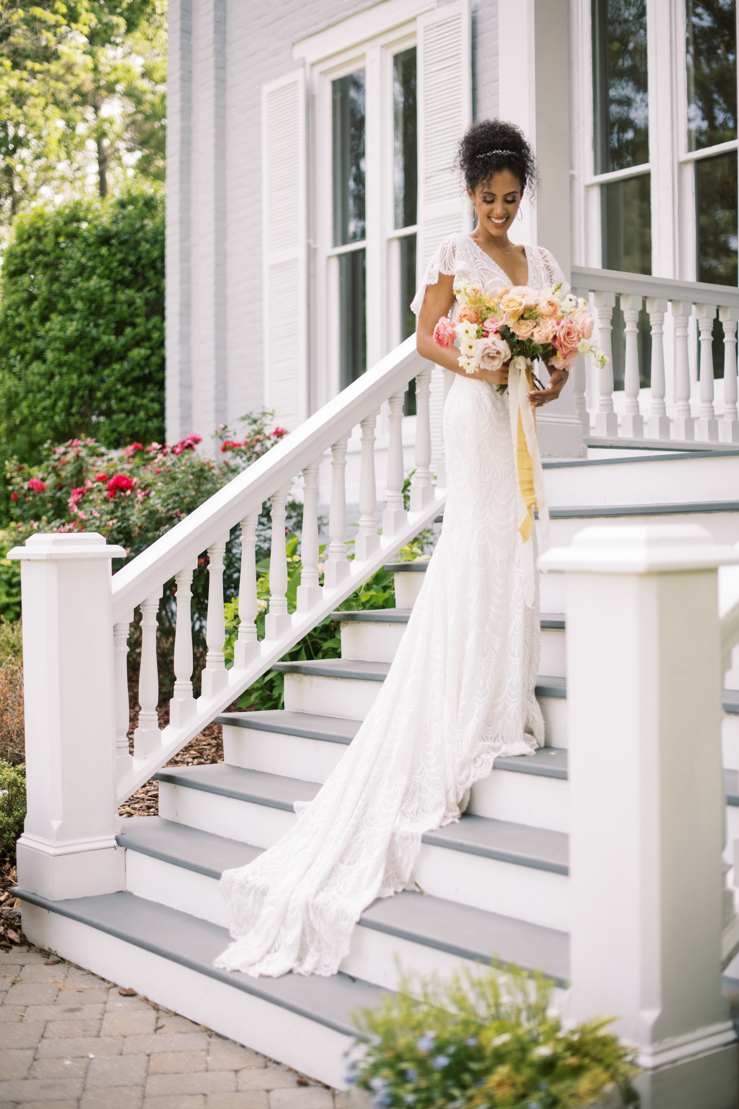 Summer Bride on Staircase at The McAlister-Leftwich House Wedding Venue Fancy This Photography