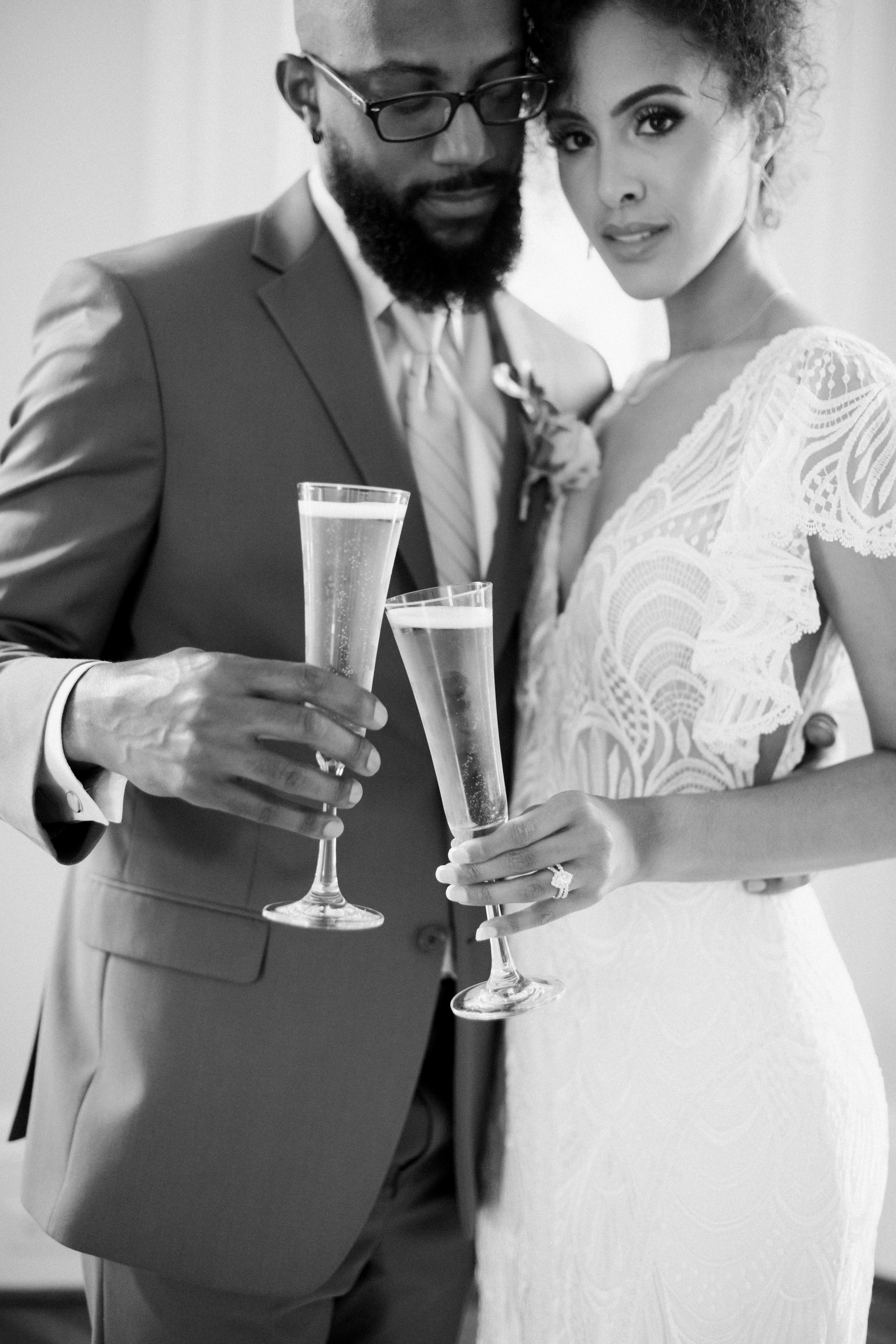 Black and White Bride and Groom Champagne Image The McAlister-Leftwich House Wedding Venue Fancy This Photography