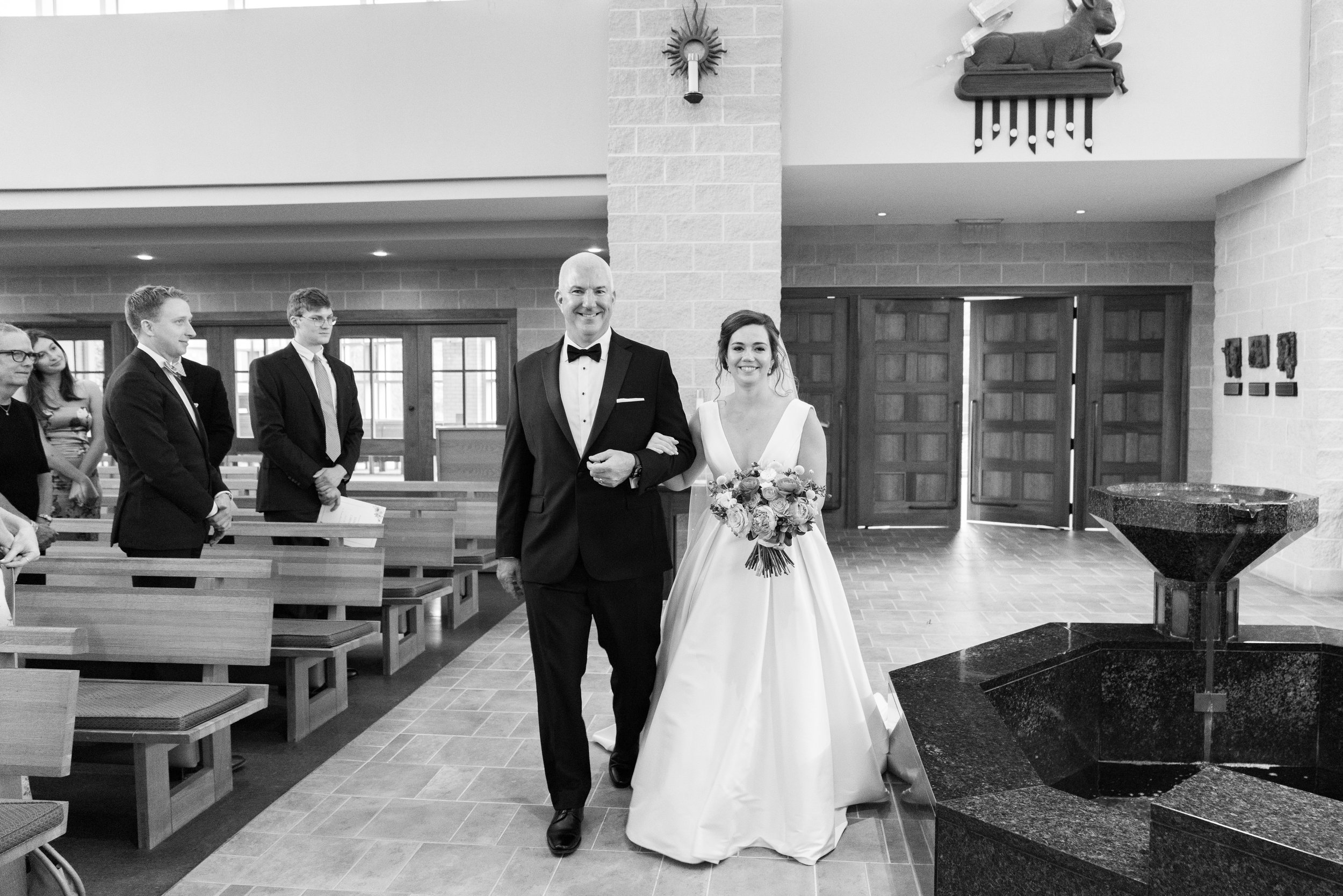 Bridal Procession St Thomas More Catholic Church UNC Chapel Hill Wedding at The Carolina Inn Fancy This Photography