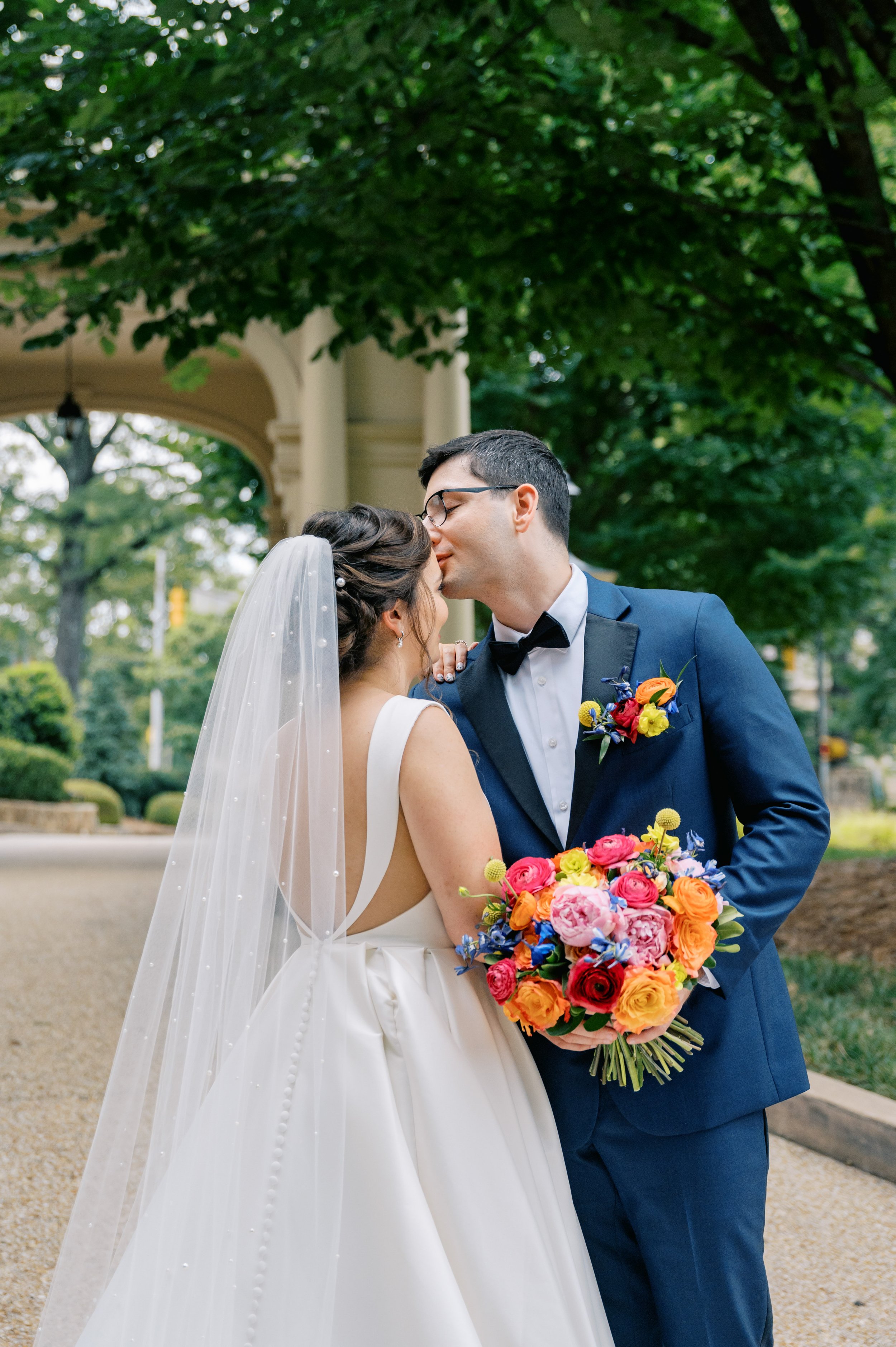 Summer Newlyweds Kiss UNC Chapel Hill Wedding at The Carolina Inn Fancy This Photography