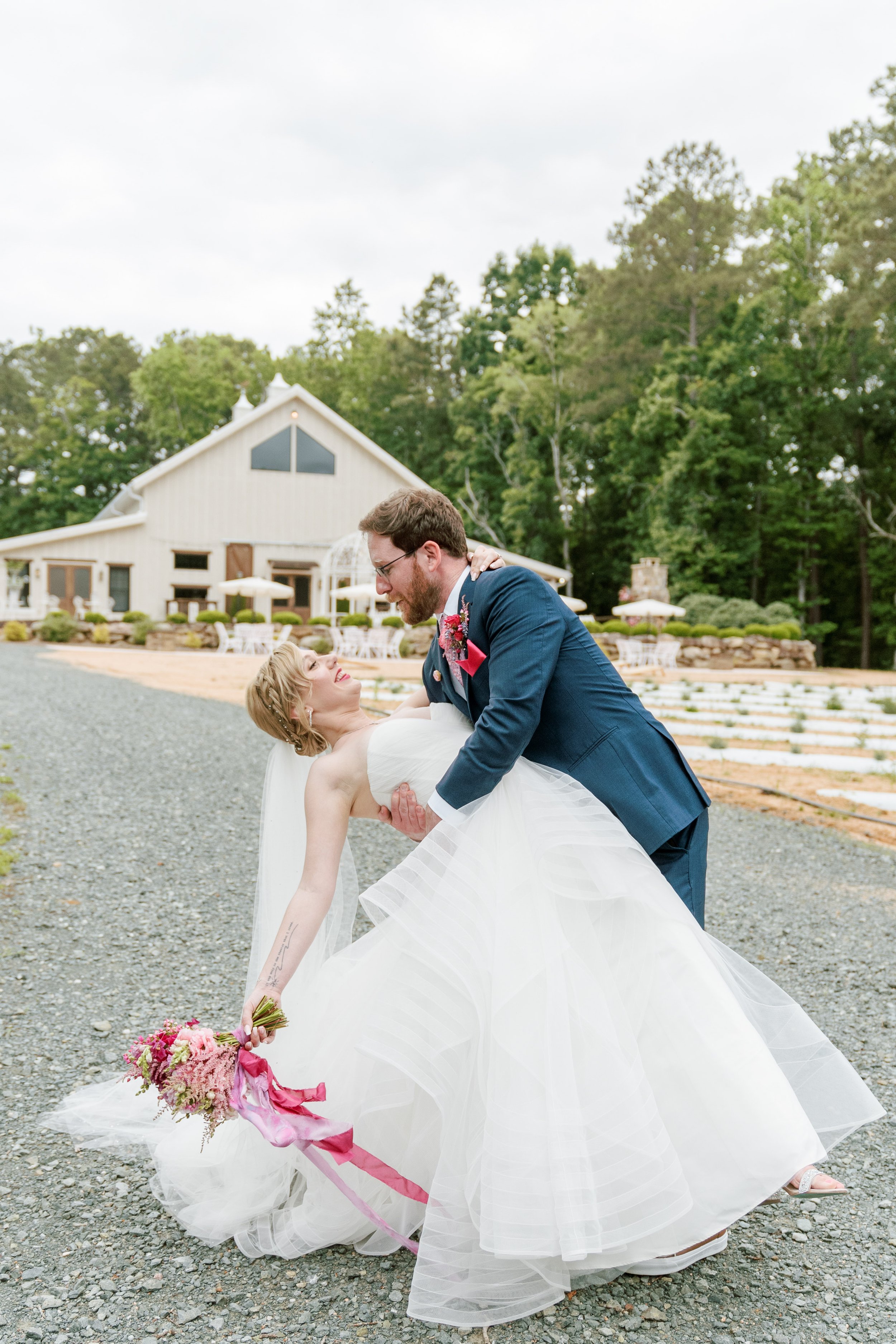 Bride and Groom Dramatic Dance White Barn Wedding at Lavender Oaks Farm in Chapel Hill Fancy This Photography