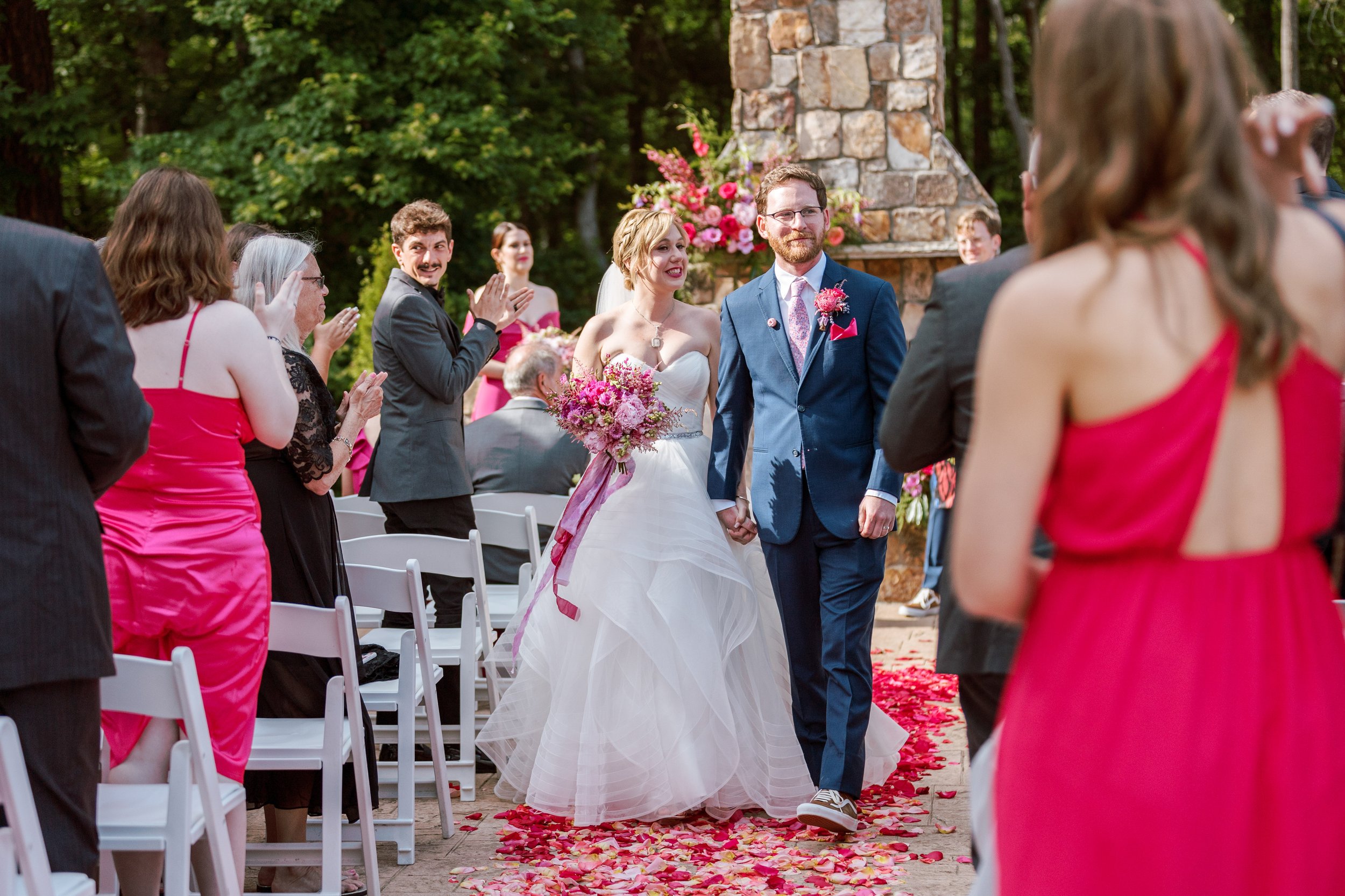 Pink Outdoor Ceremony Exit as Newlyweds Wedding at Lavender Oaks Farm in Chapel Hill Fancy This Photography