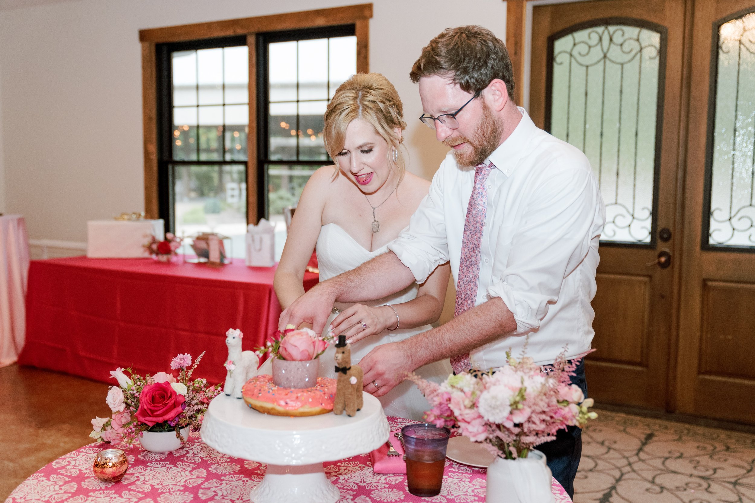 Bride and Groom Eat Donuts Wedding at Lavender Oaks Farm in Chapel Hill Fancy This Photography