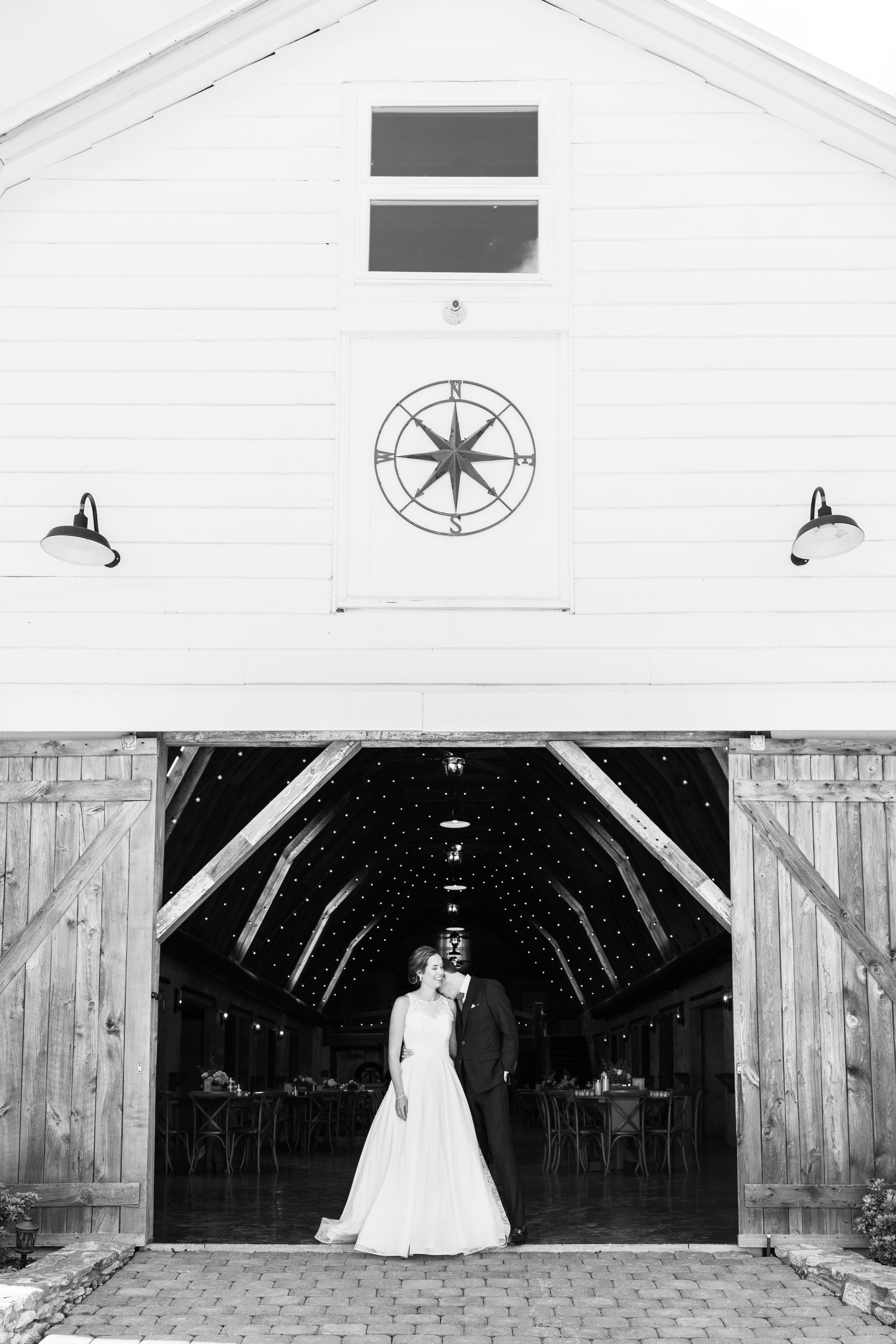 Barn Doors Bride and Groom Overlook Barn wedding in Banner Elk, NC Fancy This Photography