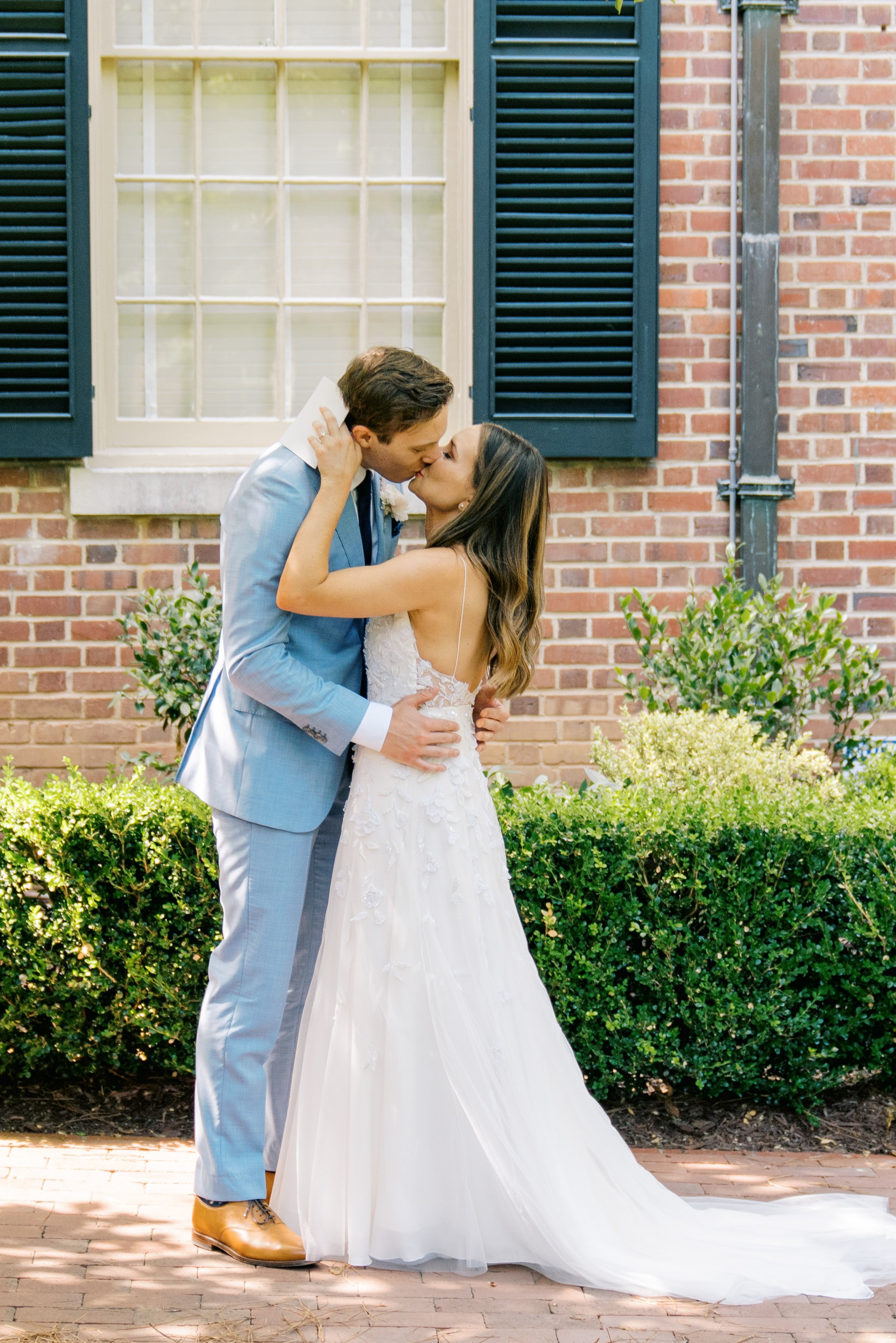 Outdoor Kiss Bride and Groom Jewish Wedding at The Carolina Inn Chapel Hill North Carolina Fancy This Photography