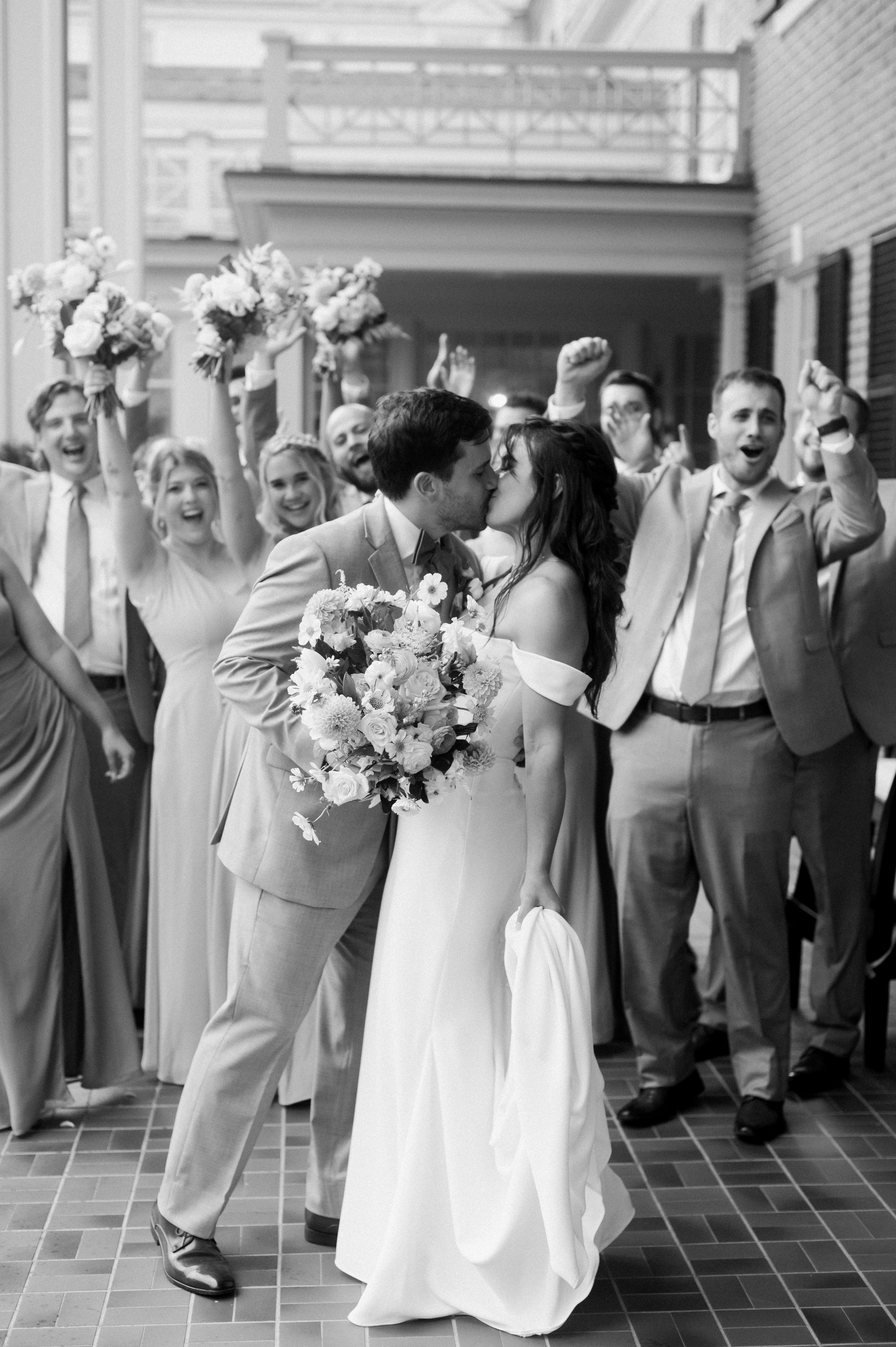 Black and White Bride and Groom Kiss Wedding Party Wedding at The Carolina Inn North Carolina Fancy This Photography