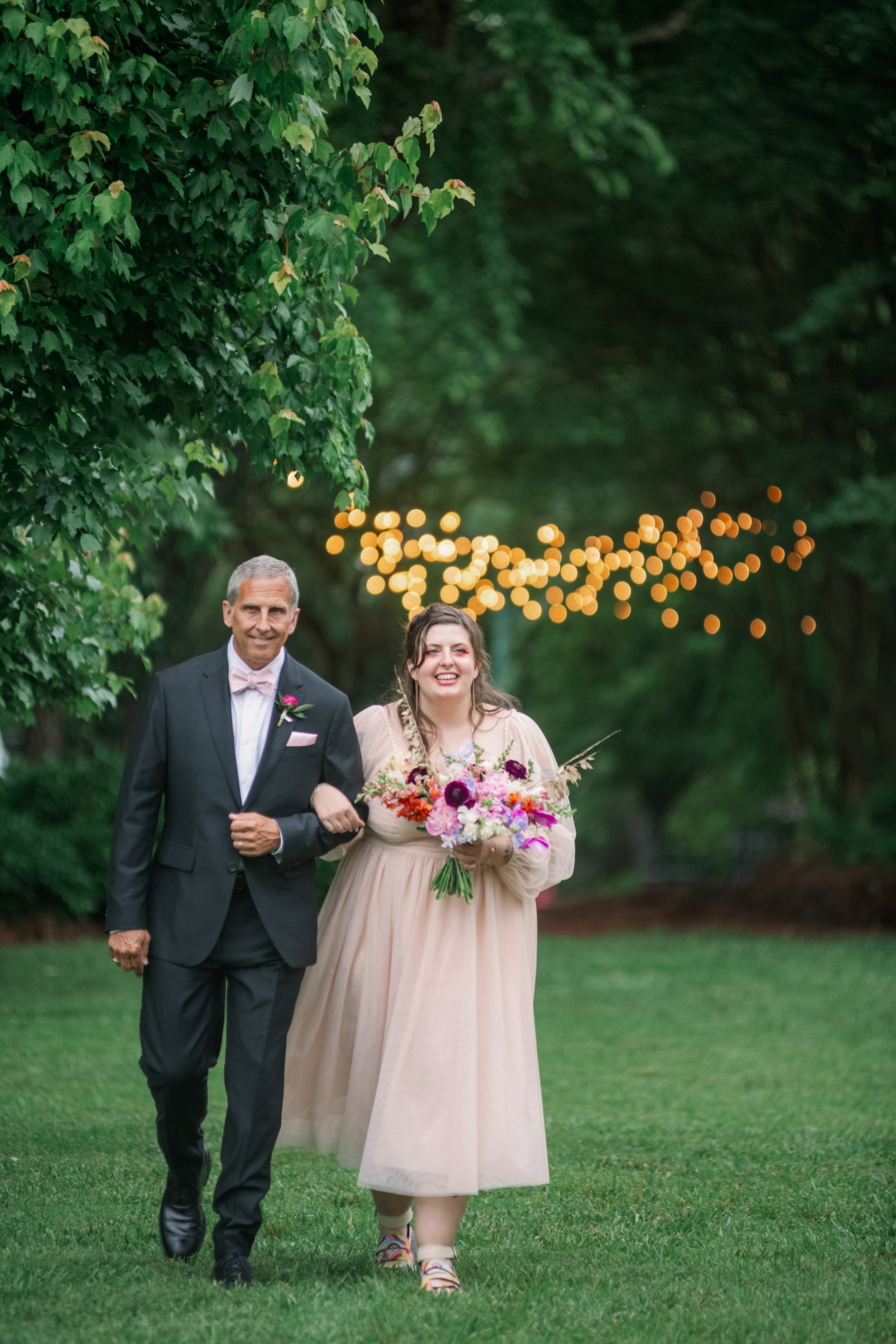 Bride Walking Outdoor Ceremony Backyard Wedding in Chapel Hill Fancy This Photography