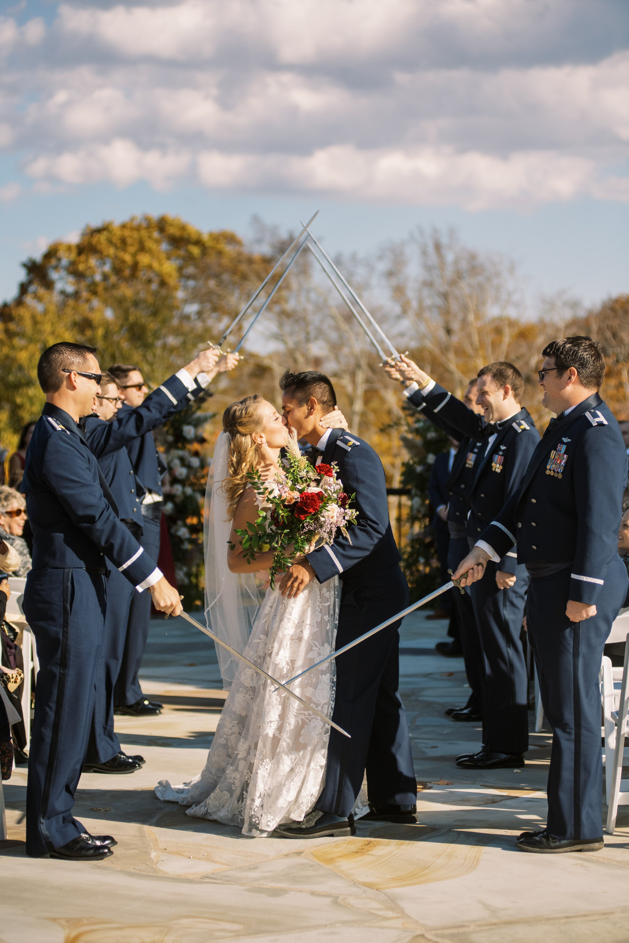 Bride and Groom Swords Tradition Air Force The Mill at Rock Creek Wedding in Boone NC Fancy This Photography 