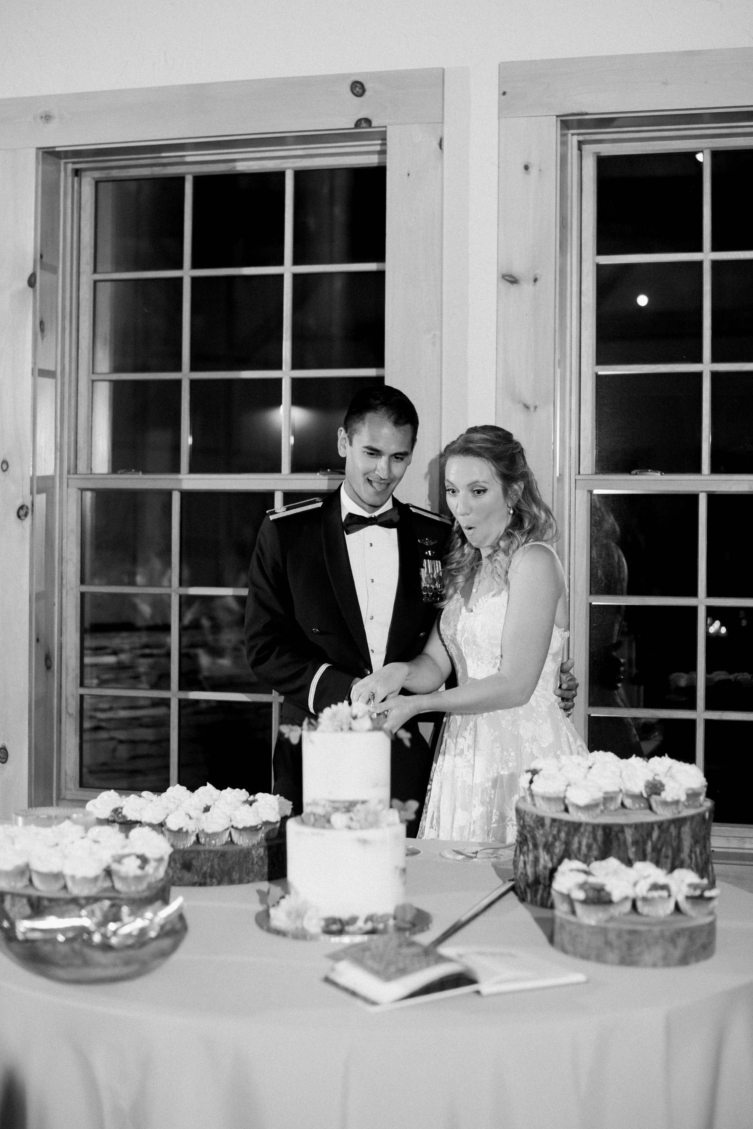 Cake Cutting The Mill at Rock Creek Wedding in Boone NC Fancy This Photography