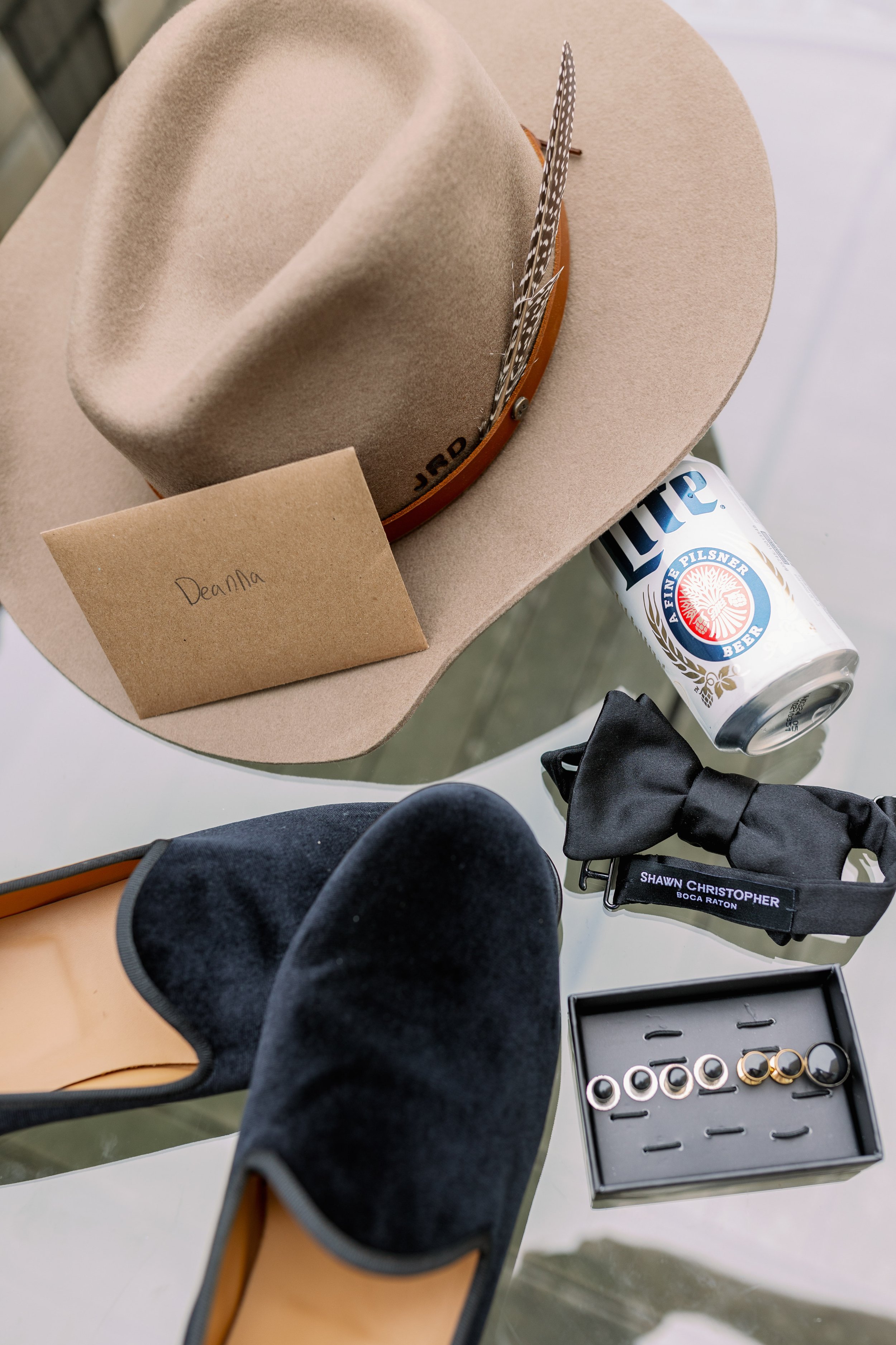 Groom Details Miller Lite Cowboy Hat Bow Tie 21c Museum Hotel Durham Haw River Ballroom Wedding in Saxapahaw NC Fancy This Photography