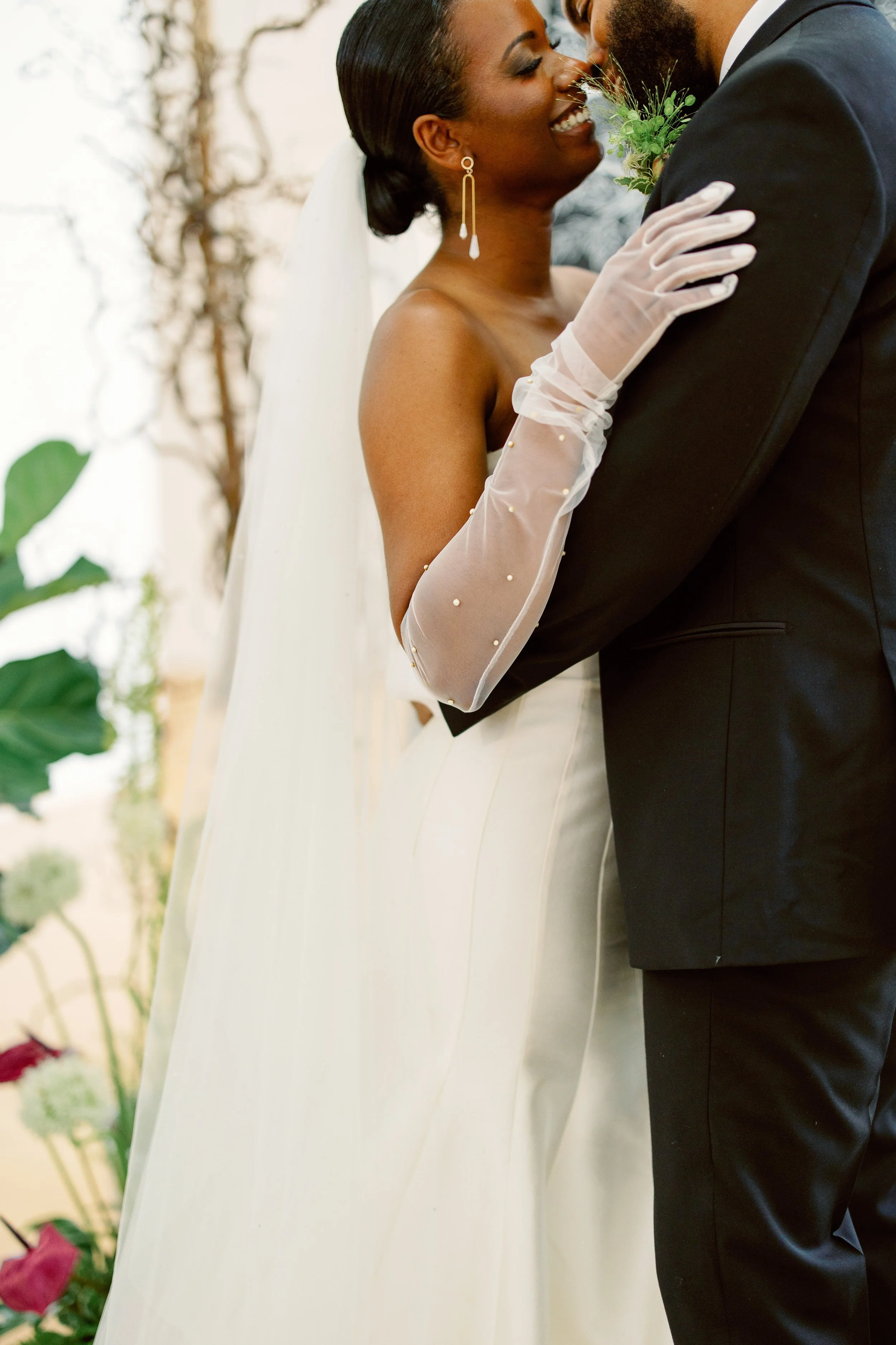 Bride and Groom Glove Hushed Commotion NCMA Wedding in Raleigh NC Fancy This Photography