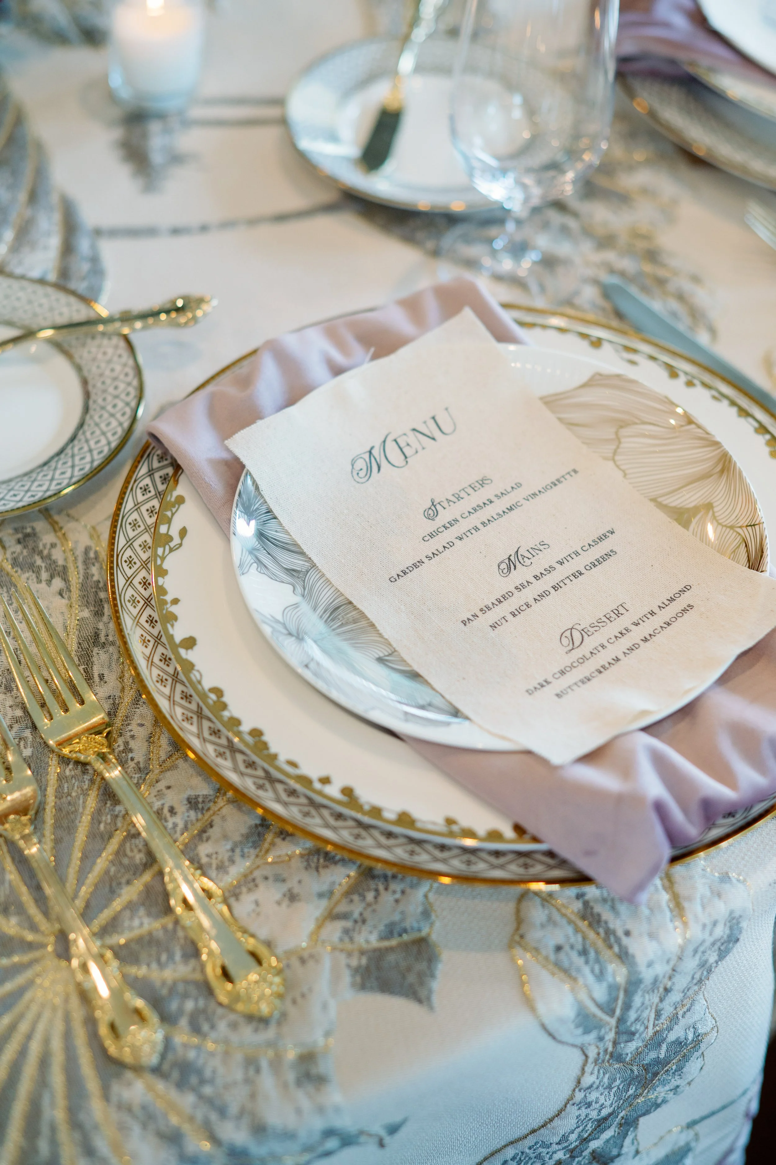 elegant wedding table setting with menu and gold flatware at McAlister-Leftwich House in Greensboro NC