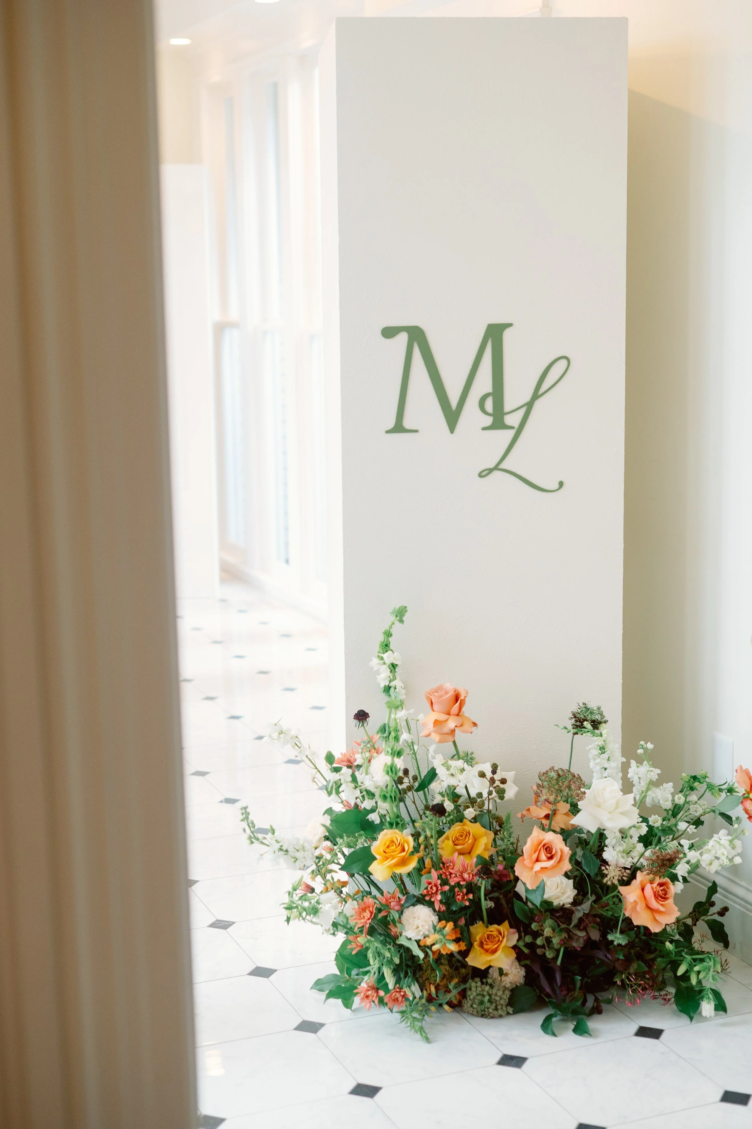 wedding monogram display with florals at McAlister-Leftwich House in Greensboro NC