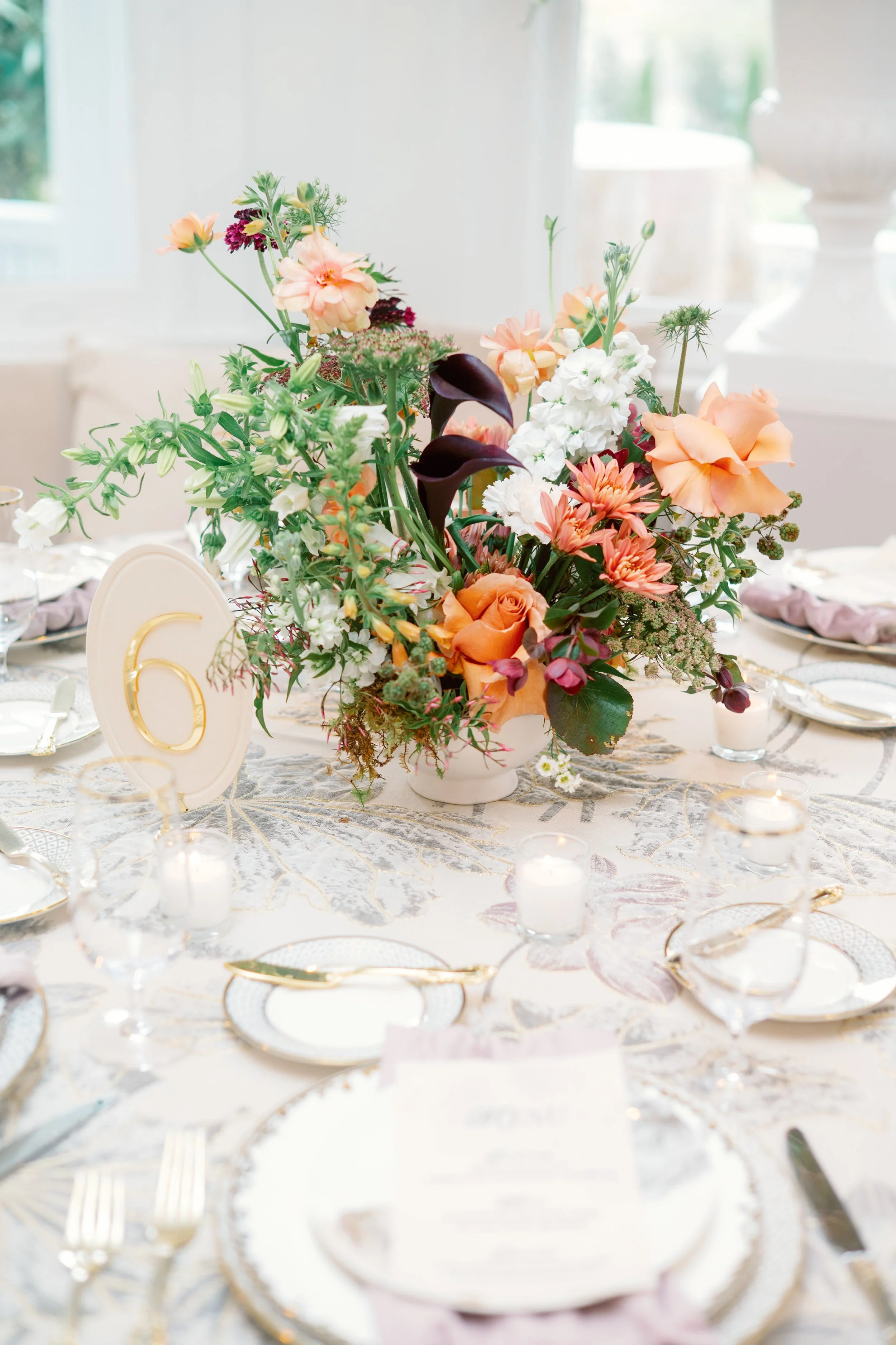 wedding table details with florals and place settings at McAlister-Leftwich House in Greensboro North Carolina