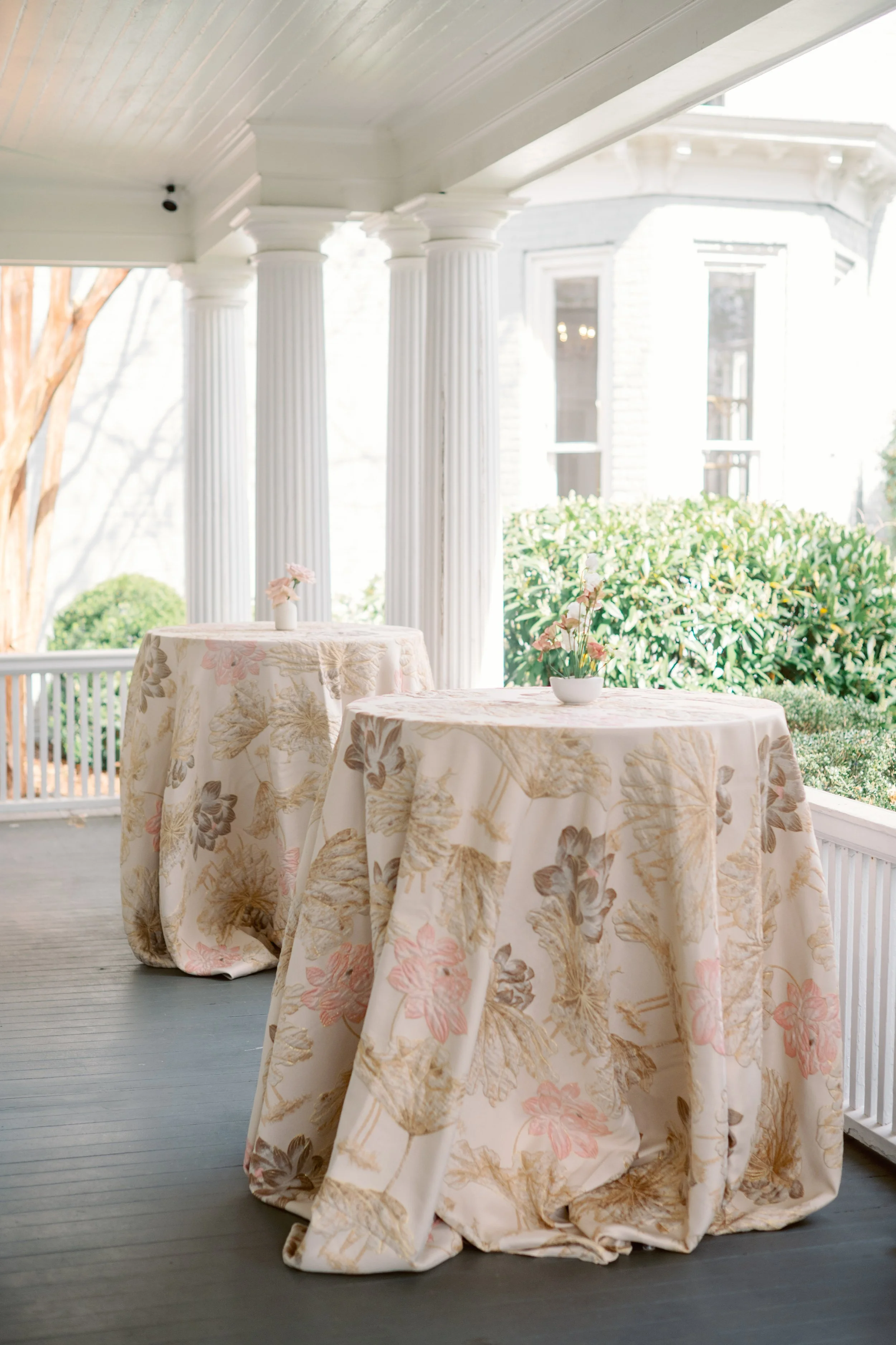 round reception table with patterned linen at McAlister-Leftwich House wedding in Greensboro NC 