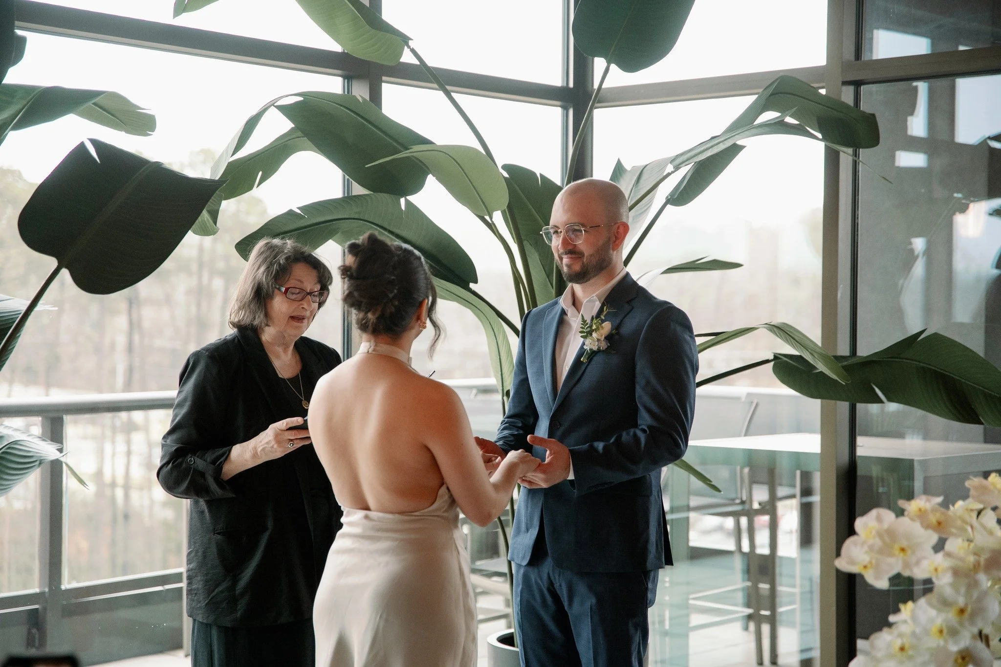 There is something about a wedding where nobody is performing. No big entrance, no receiving line, just two people saying the thing they mean in front of the people who matter. Daniela and Andrei got married at their apartment complex in Chapel Hill 