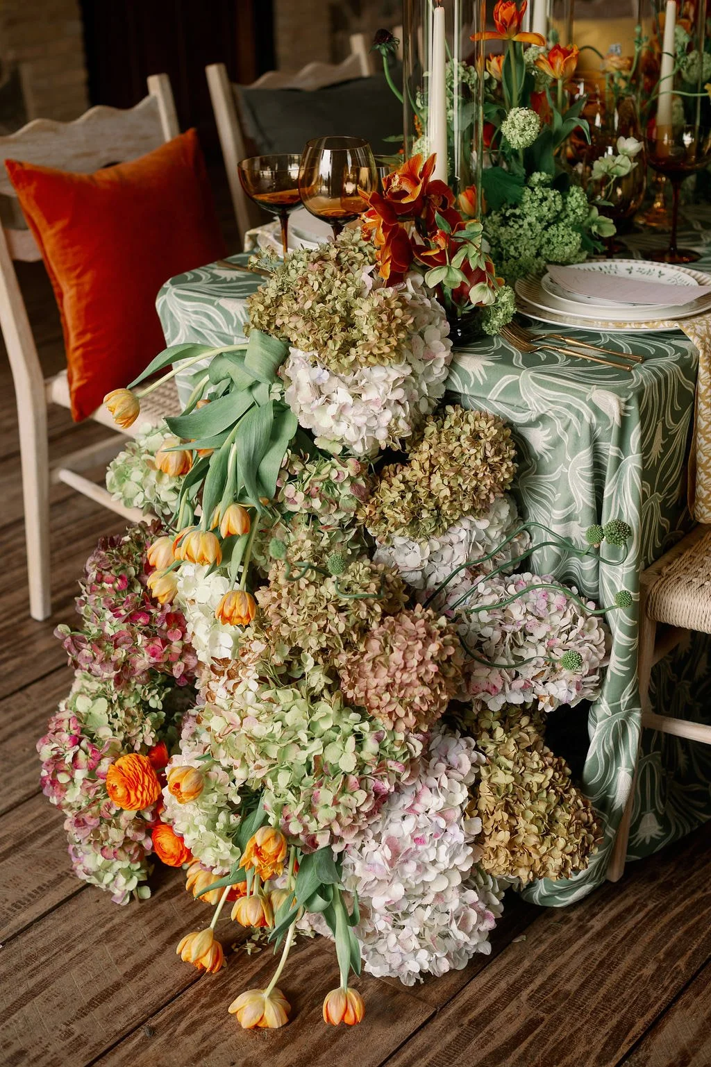  Spring tablescape with hydrangeas and tulips on green linens at The Little Chapel at Haven Ridge 