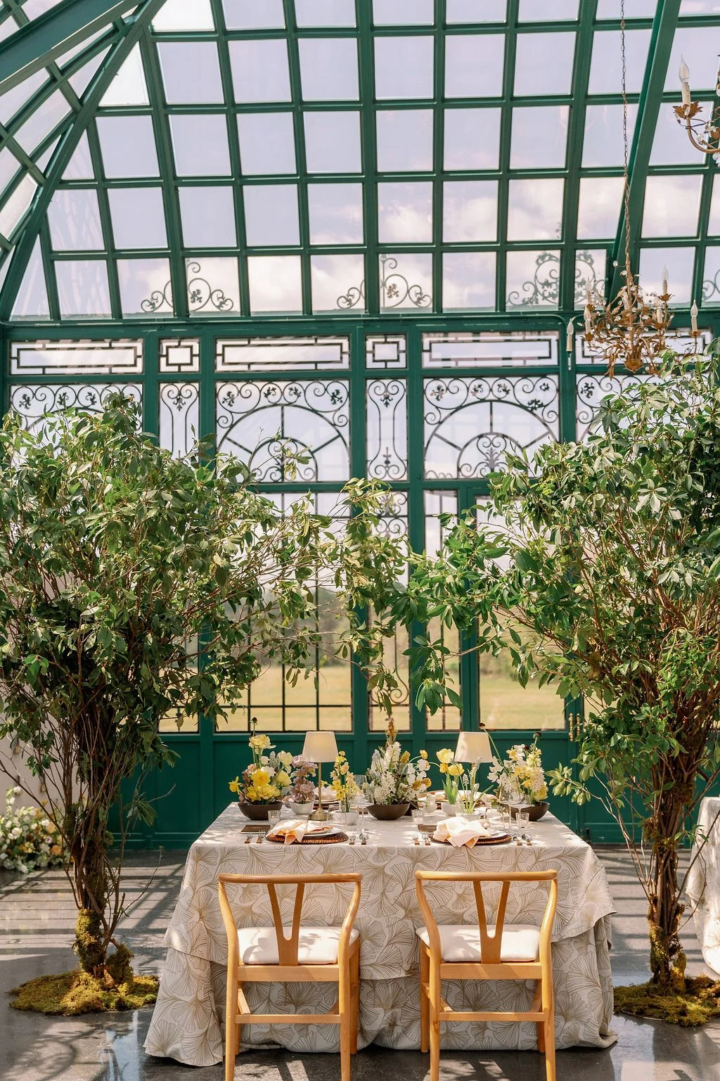  Sweetheart table framed by greenery in the Solarium at The Little Chapel at Haven Ridge 