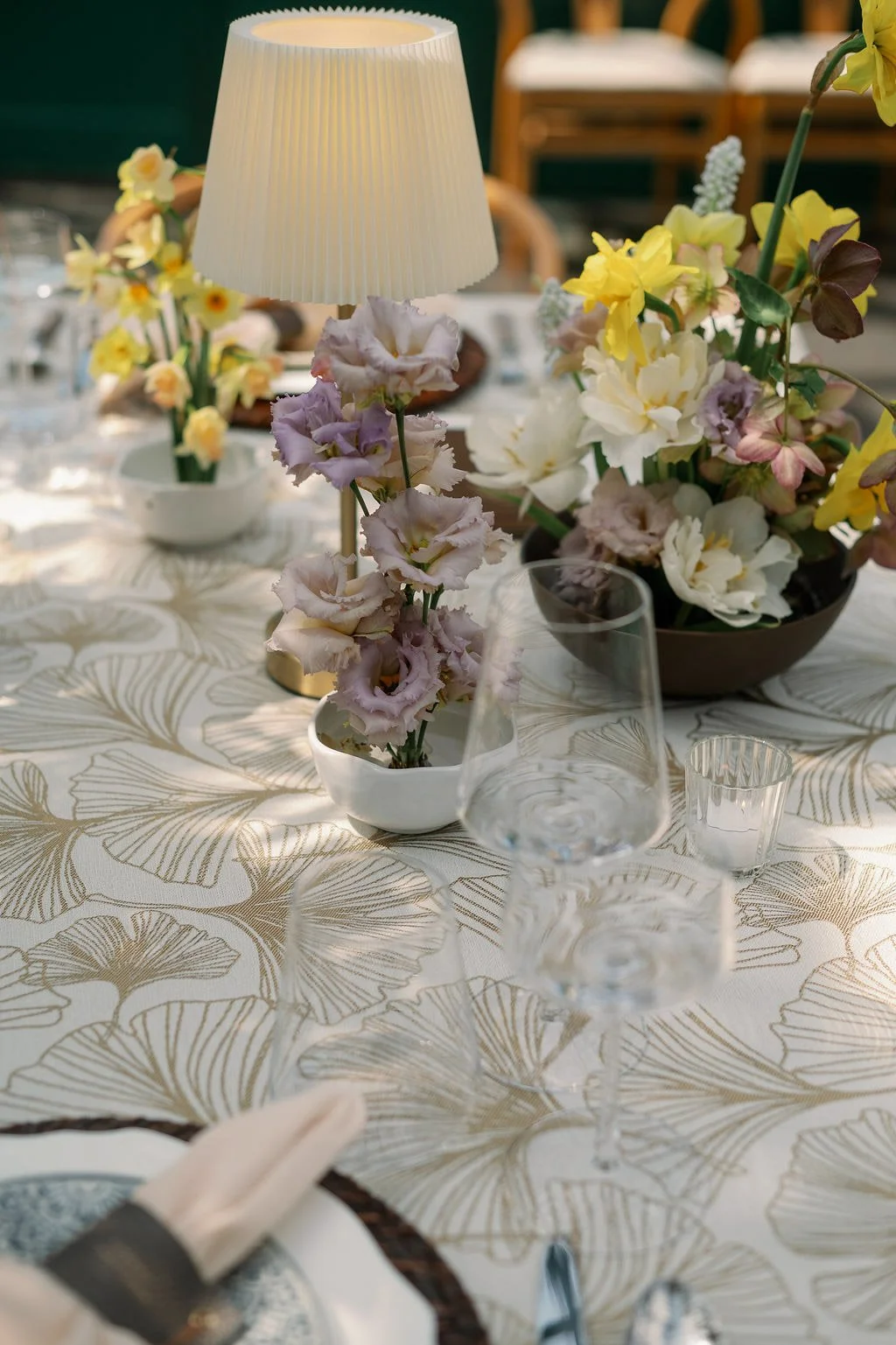  Lavender and yellow spring florals with a pleated lamp in the Solarium at The Little Chapel at Haven Ridge 