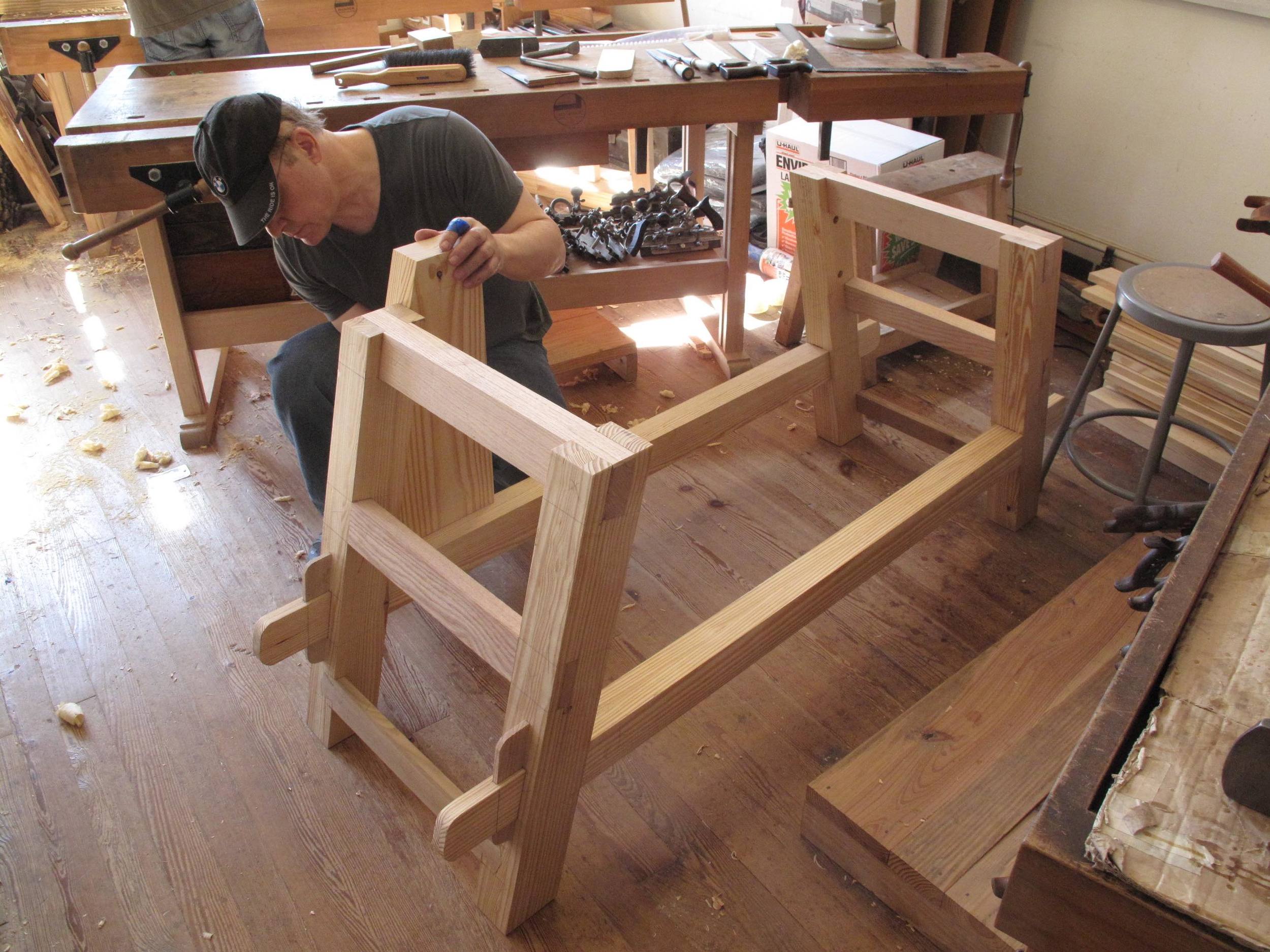 Student makes bench frame.jpg