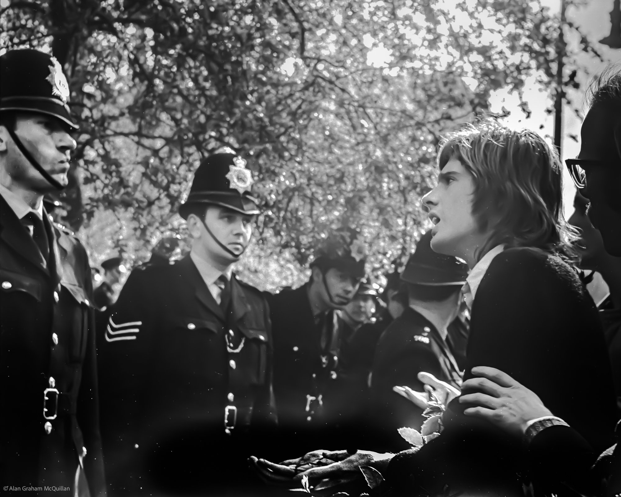 Protestor arguing with police, Grosvenor Square