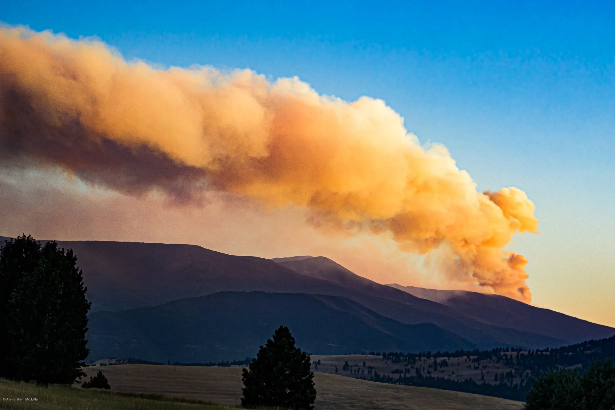 Forest fire over Lolo Peak, Montana, 2017
