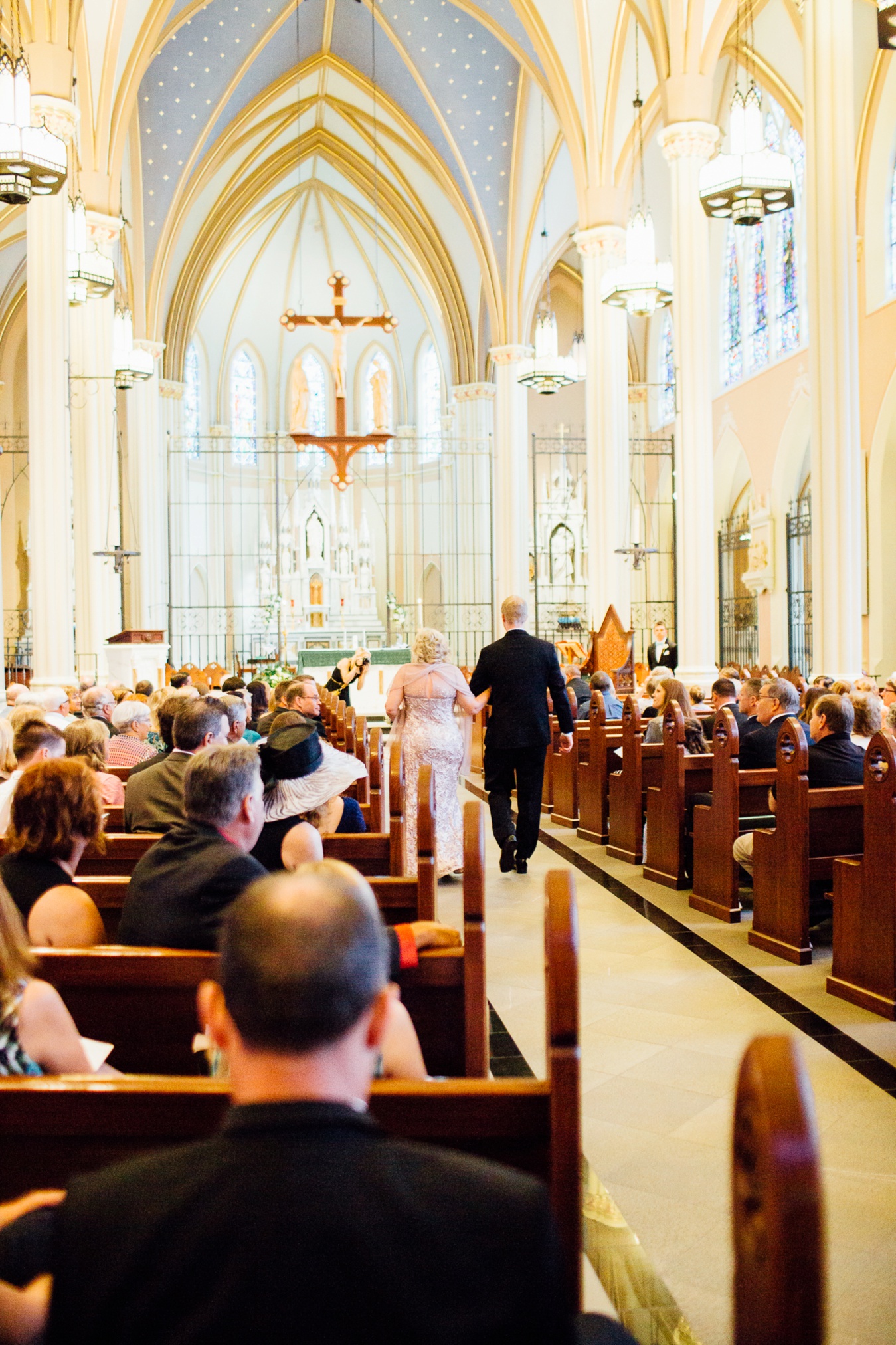 St. John's Church on Creighton's campus. Boop. Grabbing the bride's momma walking down the aisle.