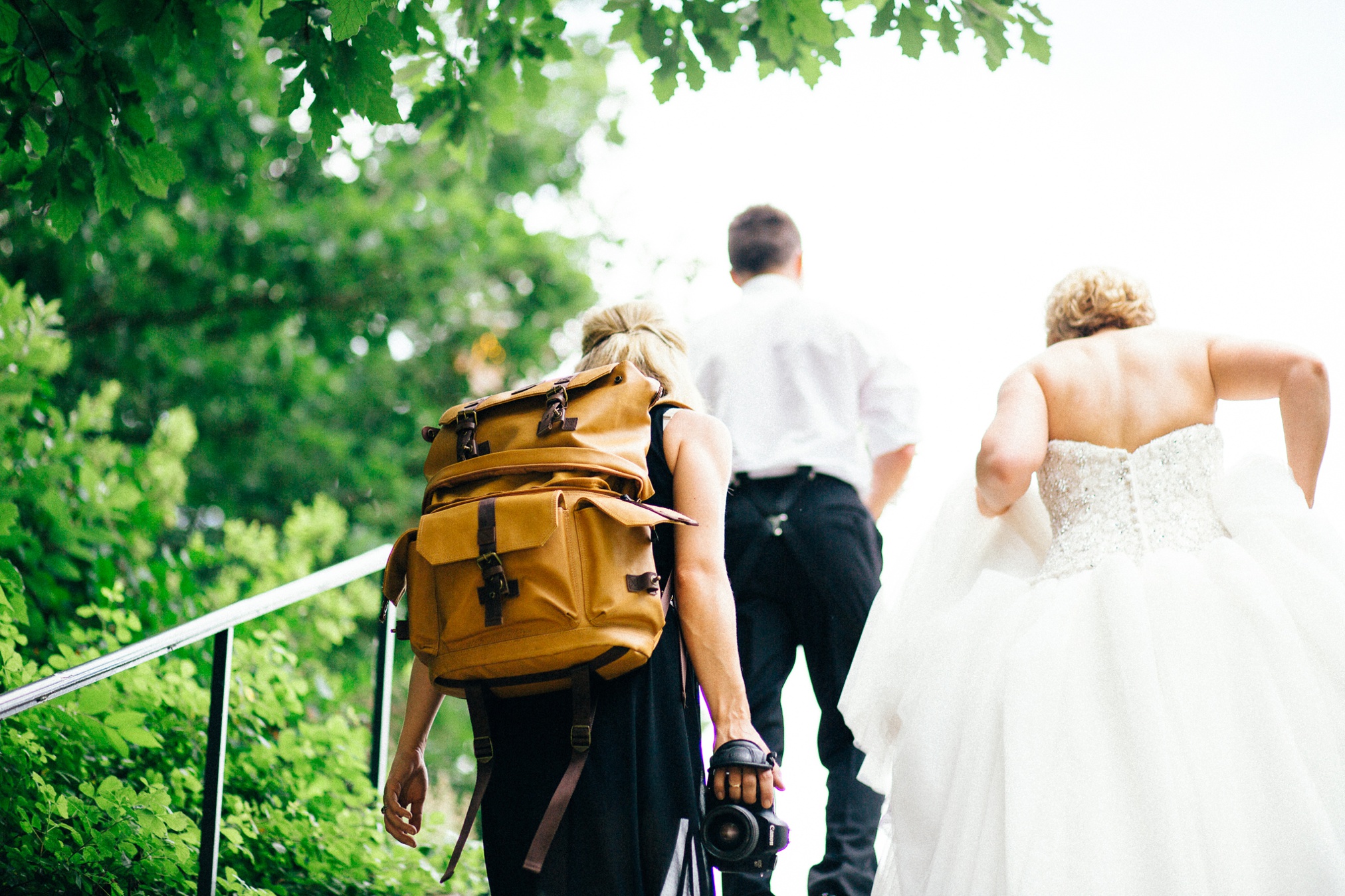 My giant arm vain and I following the bride and groom.