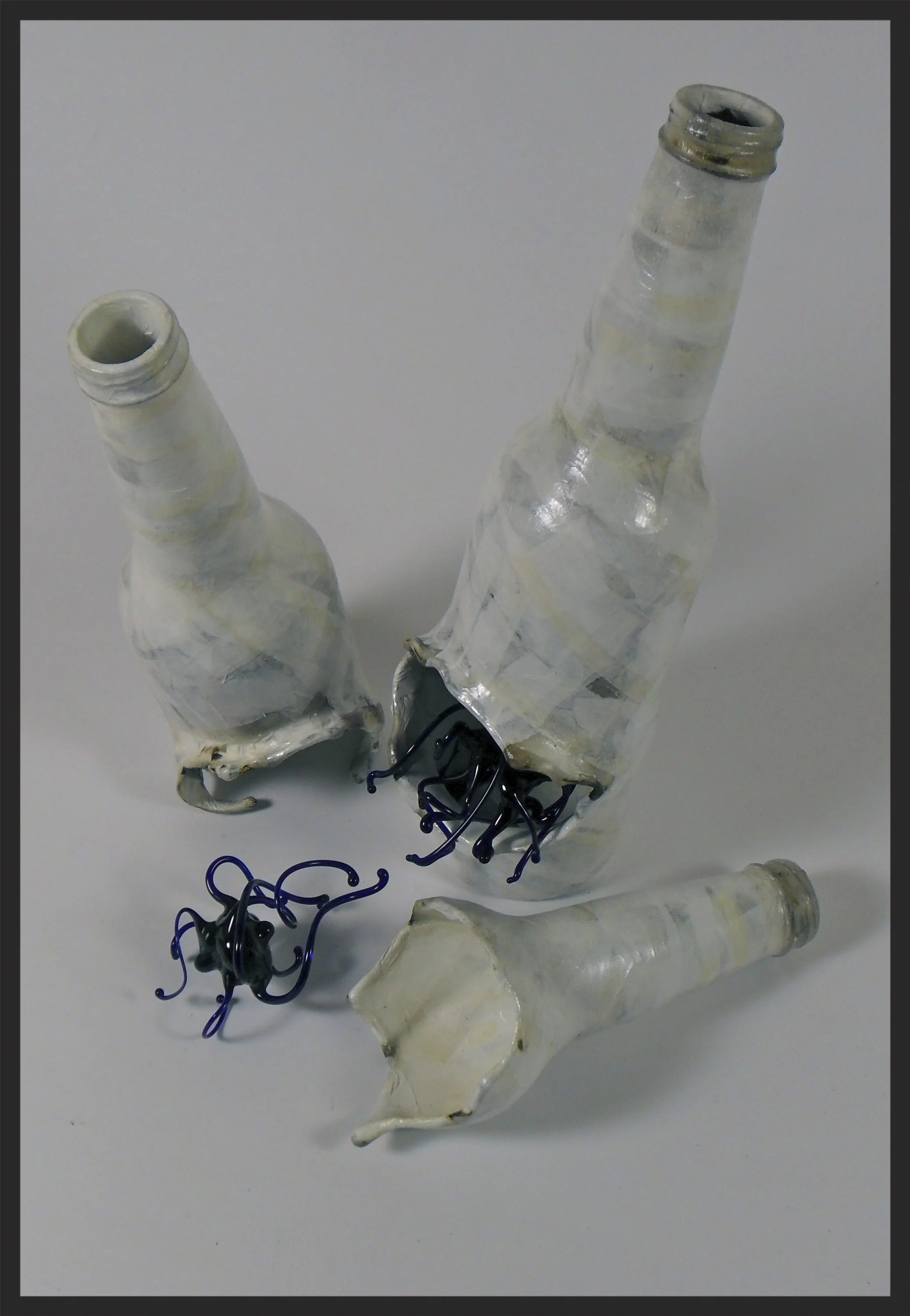  Recycled beer bottles, rolling paper, borosilicate  2012 