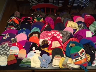Hats for Nepal collection by Rhonda Levine- several hats made by MadWool knitters! Thank you so much!!